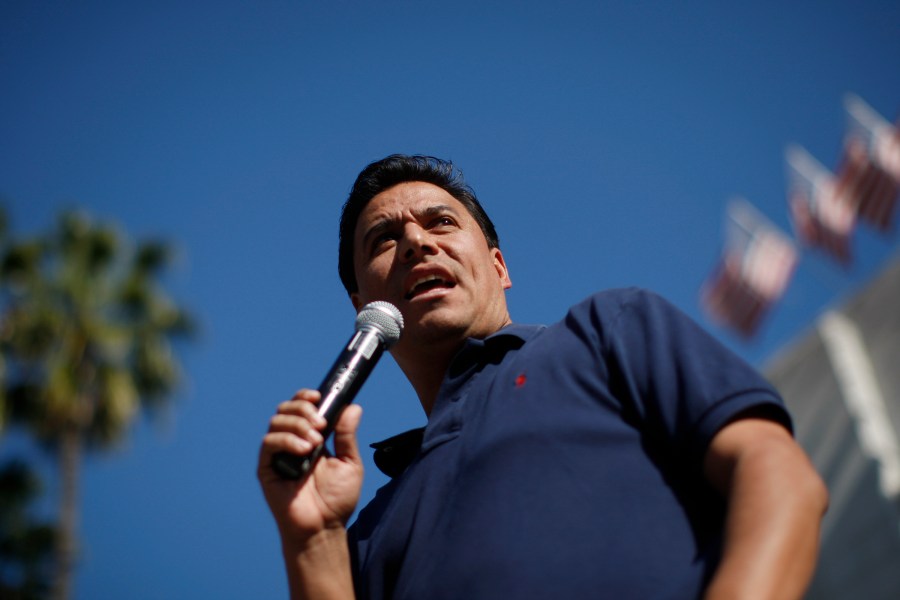 Los Angeles Councilman Jose Huizar speaks on the steps of City Hall during a rally on February 17, 2013 in Los Angeles.(Credit: David McNew/Getty Images)