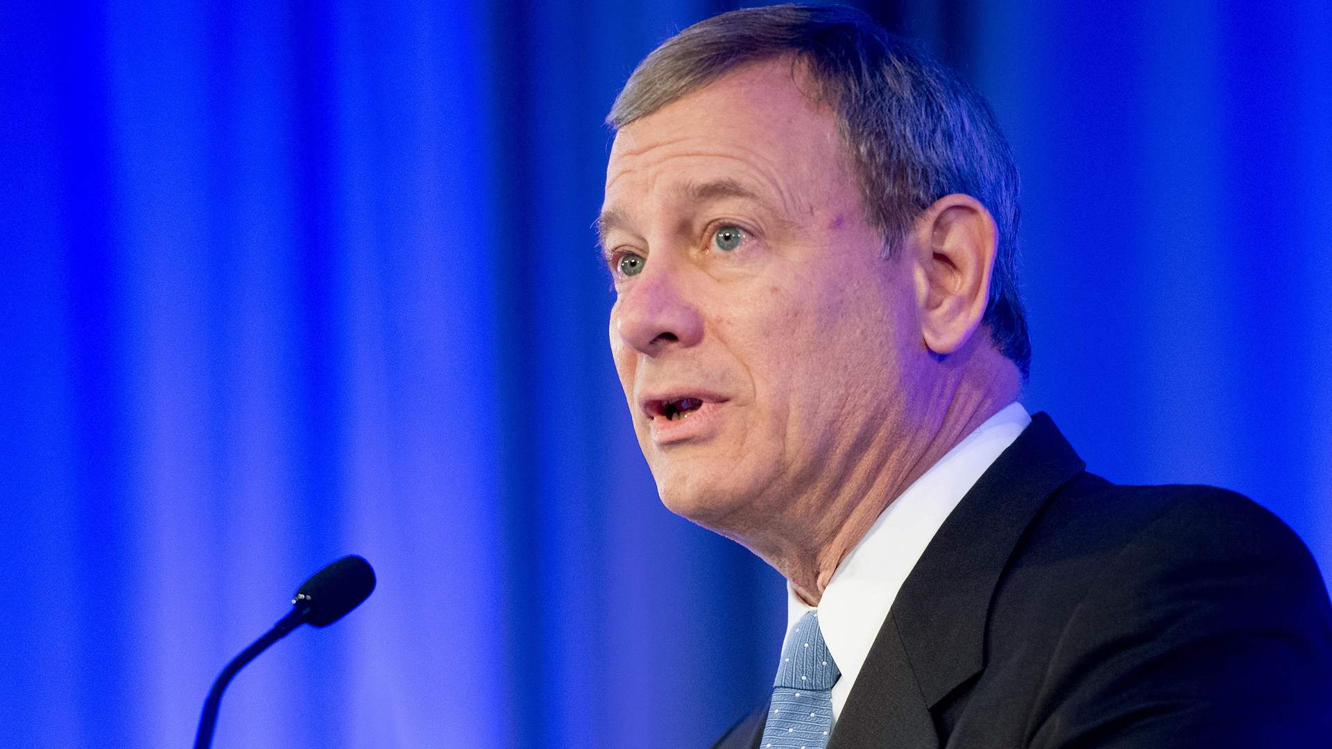 Supreme Court Chief Justice John Roberts speaks before presenting Supreme Court Justice Ruth Bader Ginsburg the American Law Institute's Henry J. Friendly Medal in Washington, DC, on May 14, 2018. (JIM WATSON/AFP/Getty Images)