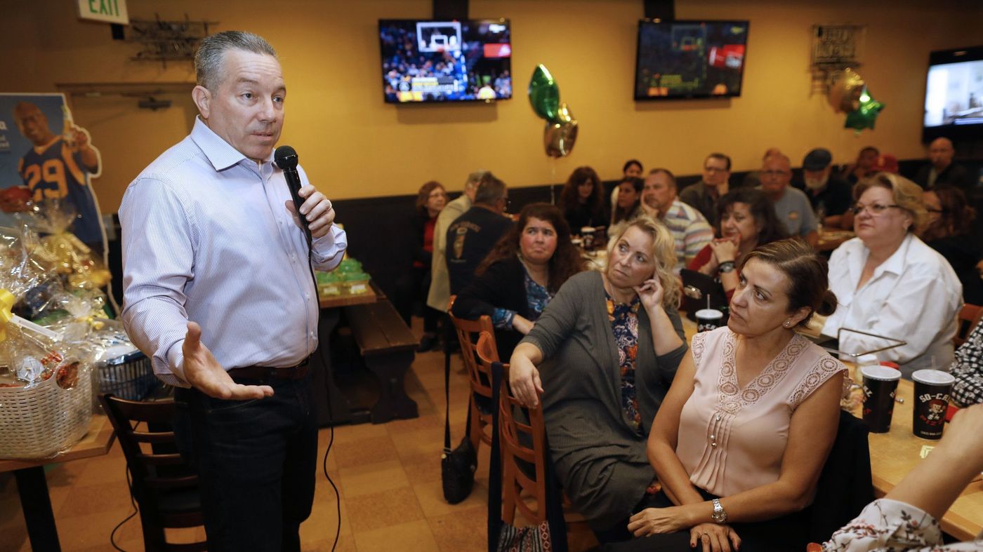 Alex Villanueva, the progressive candidate facing off with incumbent L.A. County Sheriff Jim McDonnell in the race for the leading law enforcement position is seen speaking to audience members in this 2018 photo. (Credit: Gary Coronado / Los Angeles Times)