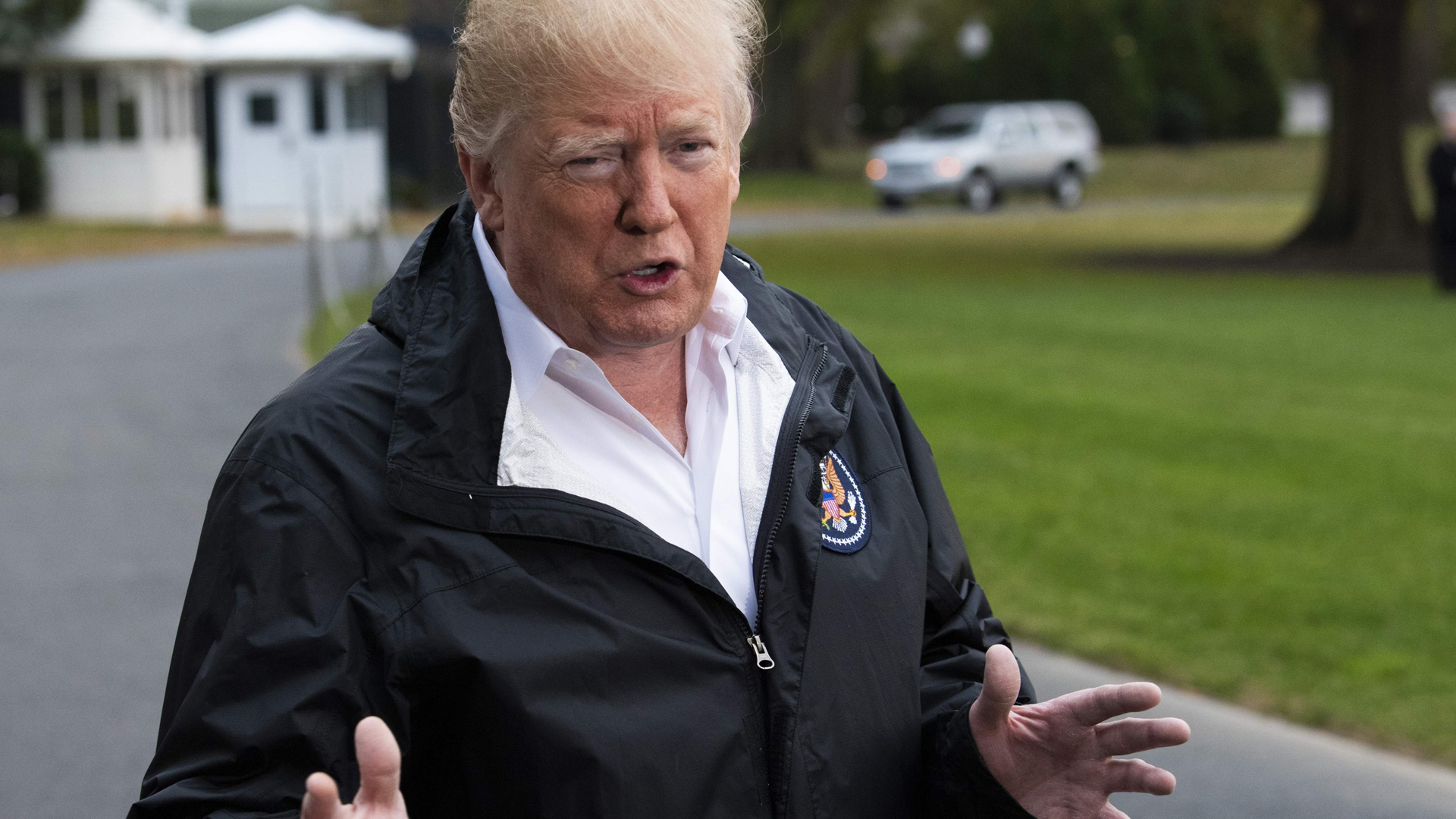 U.S. President Donald Trump talks to reporters as he leaves the White House in Washington, D.C., for California to visit the Camp Fire disaster area on Nov. 17, 2018. (Credit: ERIC BARADAT/AFP/Getty Images)