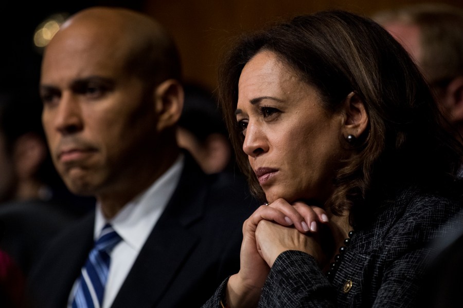 Sen. Cory Booker (D-N.J.) and Sen. Kamala Harris (D-Calif.) listen as Dr. Christine Blasey Ford testifies during the Senate Judiciary Committee hearing on the nomination of Brett M. Kavanaugh to be an associate justice of the Supreme Court of the United States on Capitol Hill Sept. 27, 2018, in Washington, D.C. The two and South Carolina Sen. Tim Scott proposed a bill to outlaw lynching that passed in the Senate on Dec. 19, 2018. (Credit: Tom Williams-Pool/Getty Images)