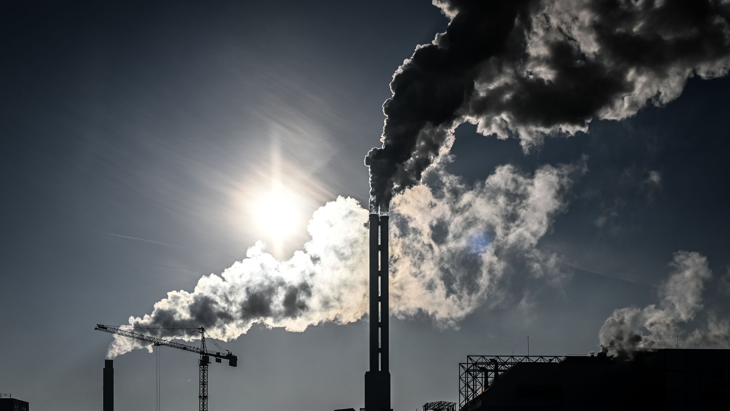 Smoke rises from the chimneys of a waste incineration plant in Saint-Ouen on the outskirts of the French capital Paris, on December 12, 2018. (Credit: PHILIPPE LOPEZ/AFP/Getty Images)