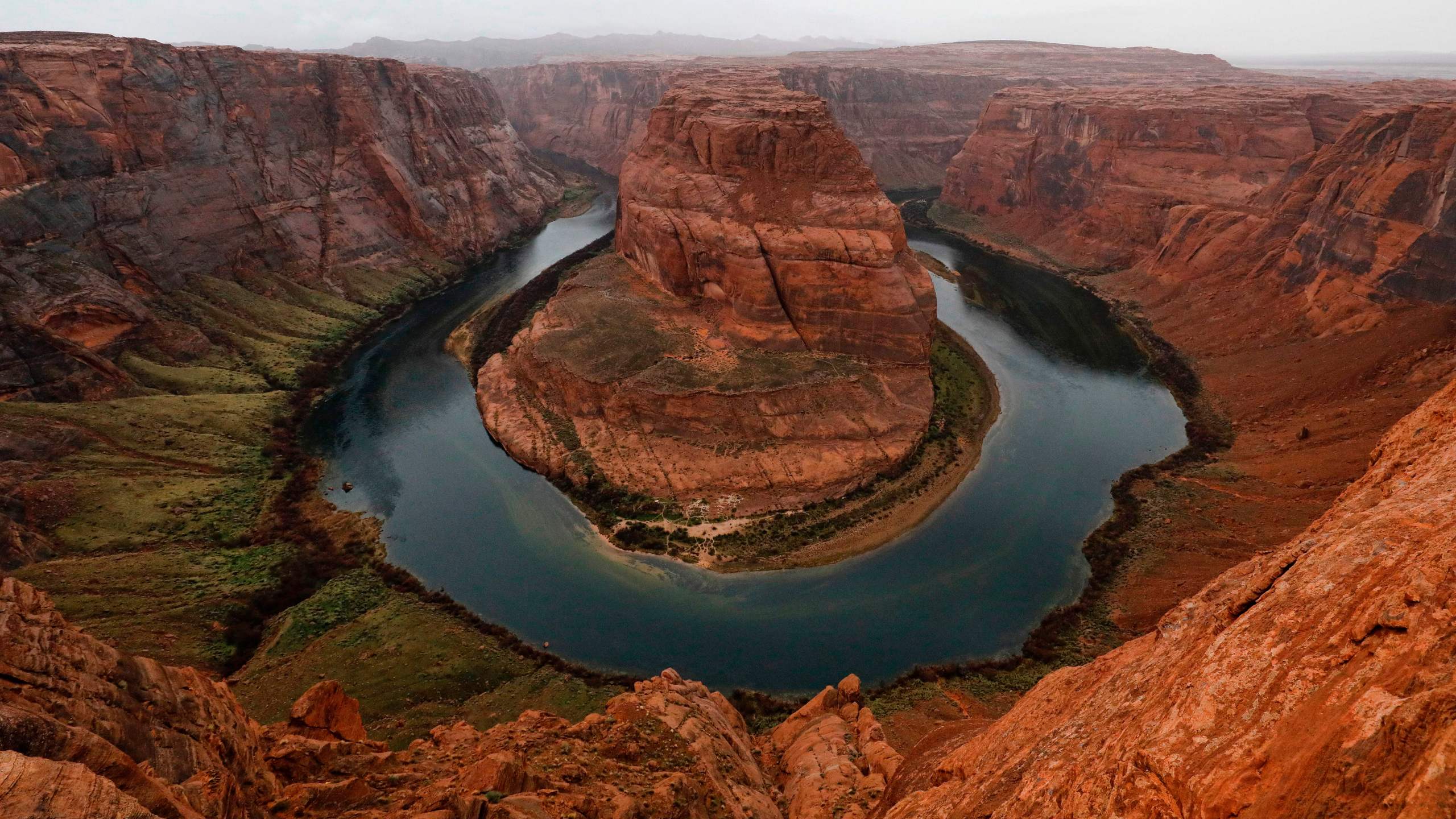 The Colorado River wraps around Horseshoe Bend in the in Glen Canyon National Recreation Area in Page, Arizona, on Feb. 11, 2017. (Credit: Rhona Wise / AFP / Getty Images)