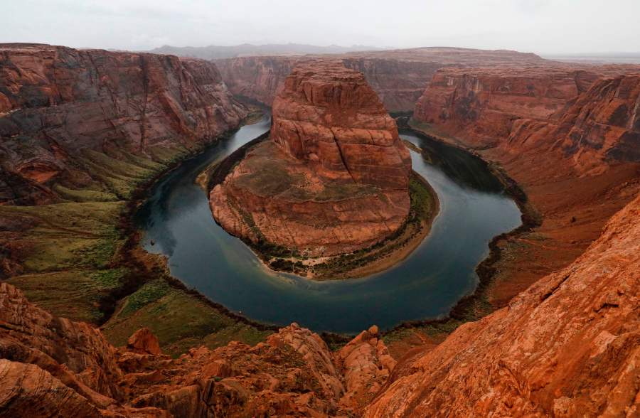 The Colorado River wraps around Horseshoe Bend in the in Glen Canyon National Recreation Area in Page, Arizona, on Feb. 11, 2017. (Credit: Rhona Wise / AFP / Getty Images)