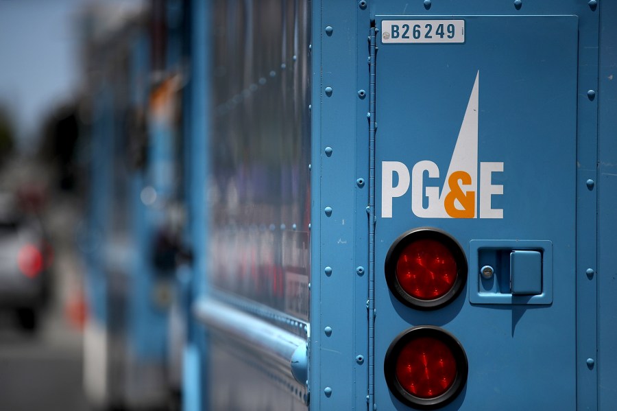 Pacific Gas and Electric trucks sit parked on a street on June 18, 2018, in San Francisco. (Credit: Justin Sullivan/Getty Images)