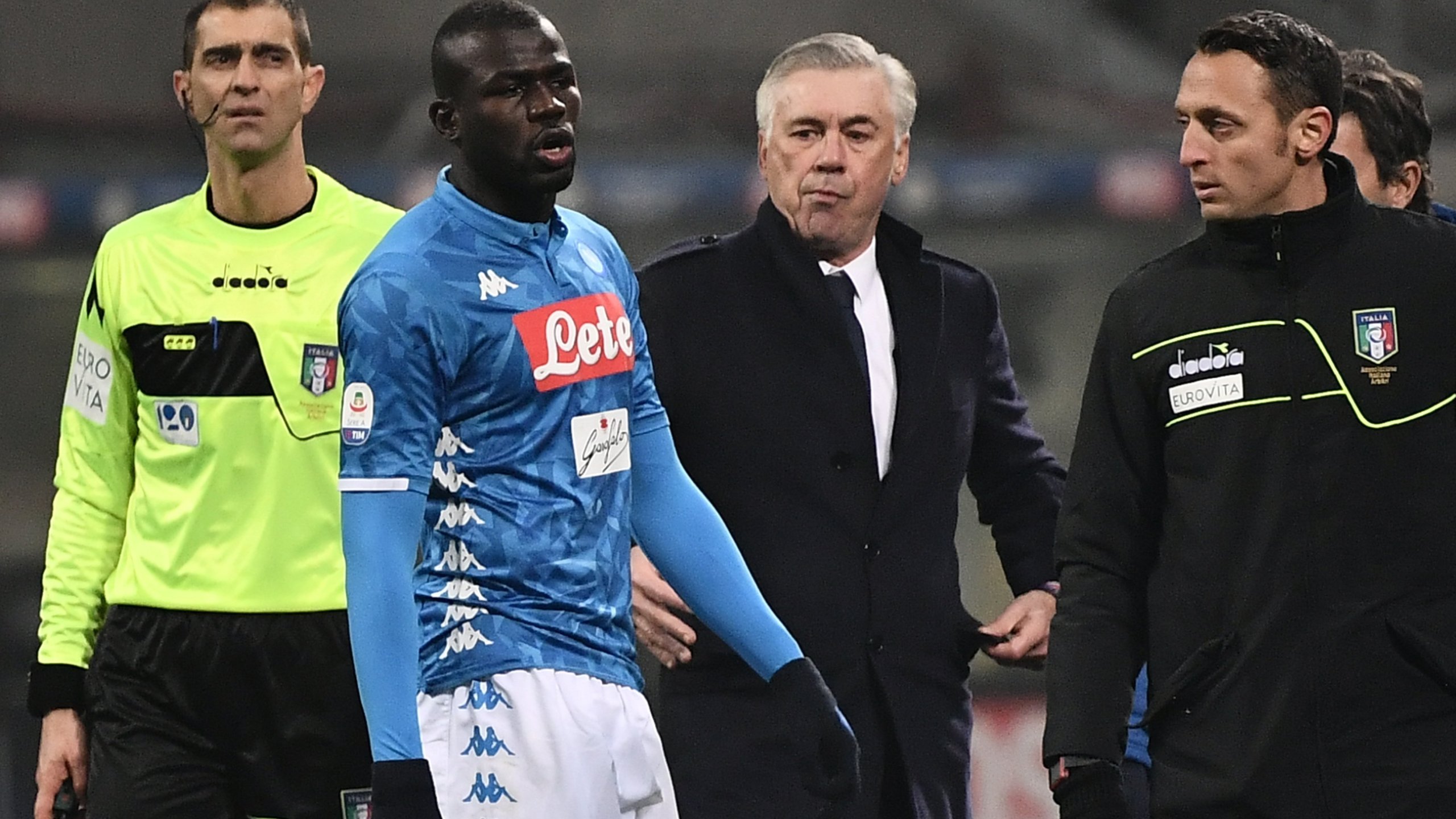 Kalidou Koulibaly leaves the pitch after receiving a red card in the game against Inter. Napoli coach Carlo Ancelotti says the next time a member of his team is racially abused the way Koulibaly was, he'd be happy for the Serie A side to stop playing. (Credit: Marco Bertorello AFP/Getty Images via CNN)