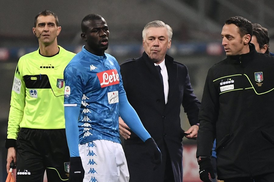 Kalidou Koulibaly leaves the pitch after receiving a red card in the game against Inter. Napoli coach Carlo Ancelotti says the next time a member of his team is racially abused the way Koulibaly was, he'd be happy for the Serie A side to stop playing. (Credit: Marco Bertorello AFP/Getty Images via CNN)