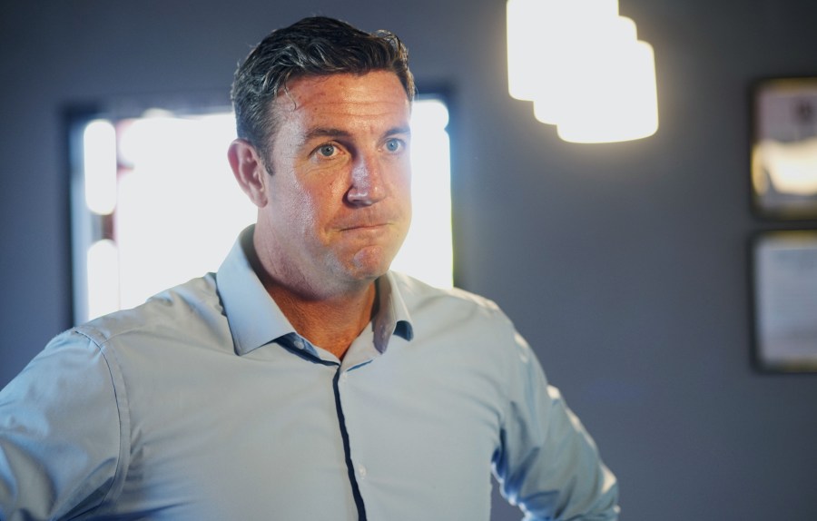 Rep. Duncan Hunter (R-CA) speaks to campaign staffers during a visit to one of his headquarters on Nov. 6, 2018, in Santee, San Diego County. (Credit: Sandy Huffaker/Getty Images)