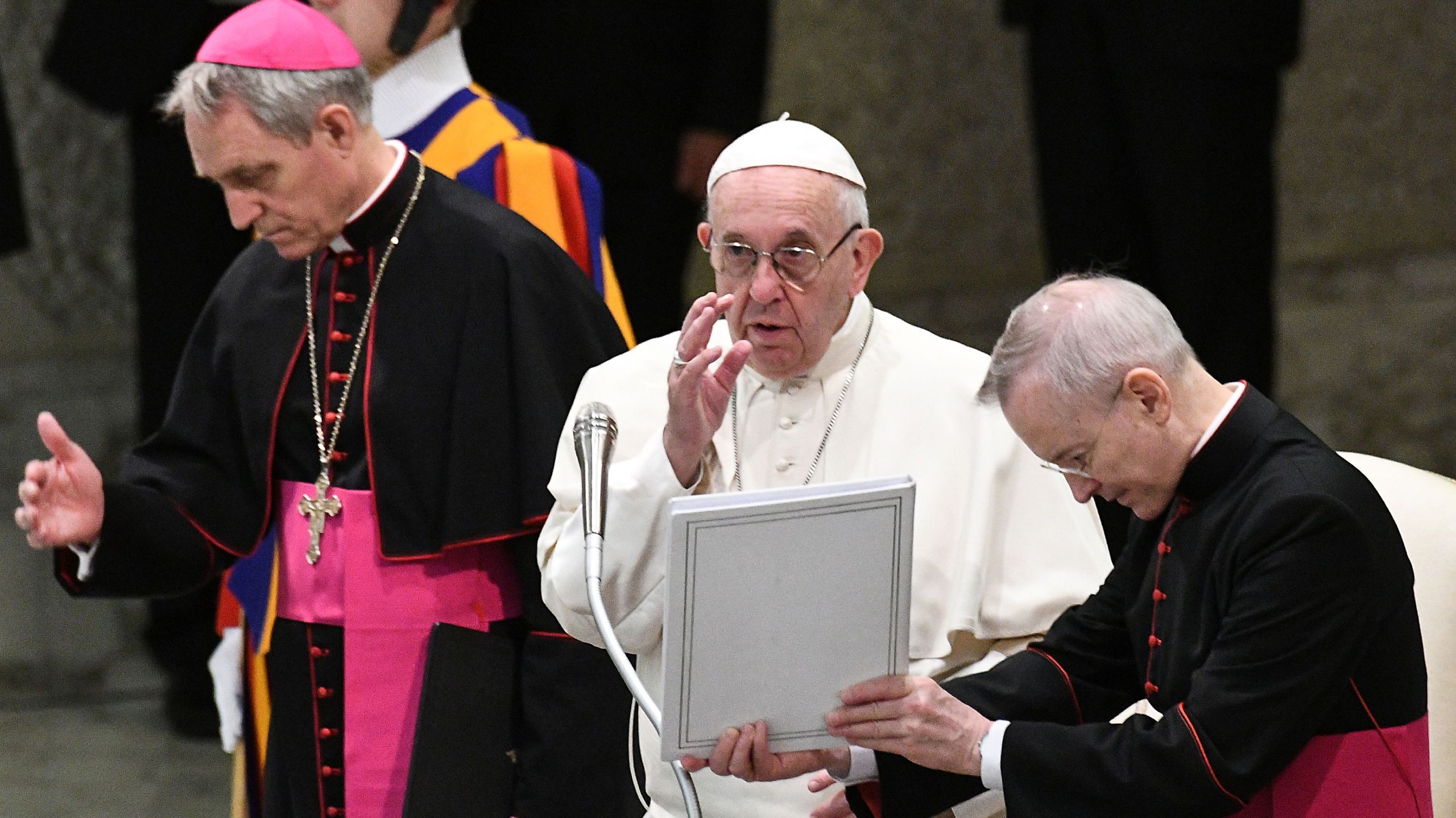 Pope Francis blesses faithfuls at the Paul VI audience hall in the Vatican at the end of his weekly general audience on Dec. 5, 2018. (Credit: Vincenzo Pinto / AFP) (Photo credit should read VINCENZO PINTO/AFP/Getty Images)