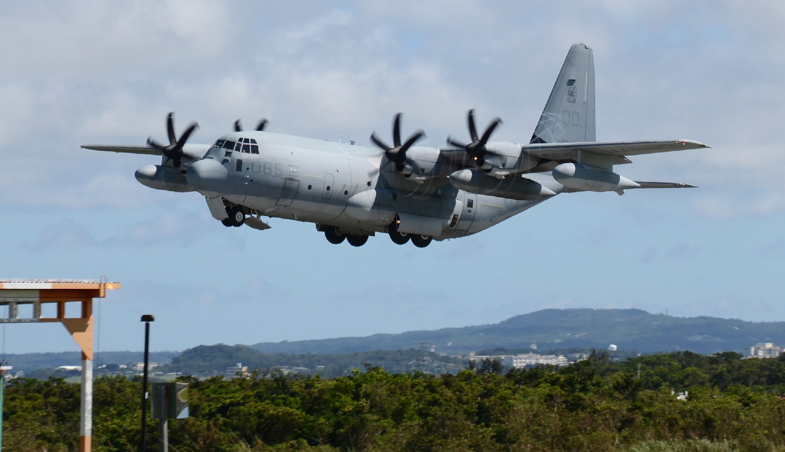 This photo taken on July 15, 2014, shows a U.S. Marine KC-130 air refuelling tanker taking-off at the Futenma air base in Okinawa, Japan. (Credit: AFP / Getty Images)