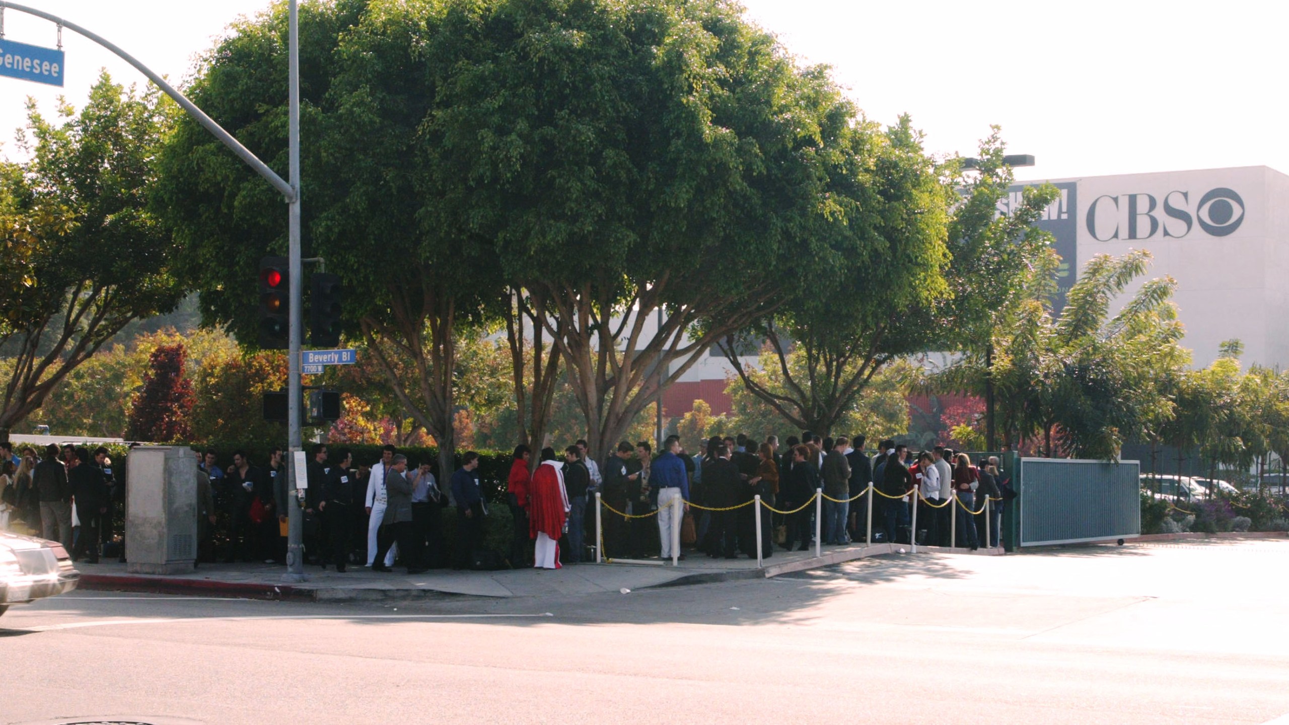 Participants wait in line outside CBS Television City for tryouts during the "Elvis" opening casting call on Oct. 10, 2004. (Credit: Frederick M. Brown / Getty Images)