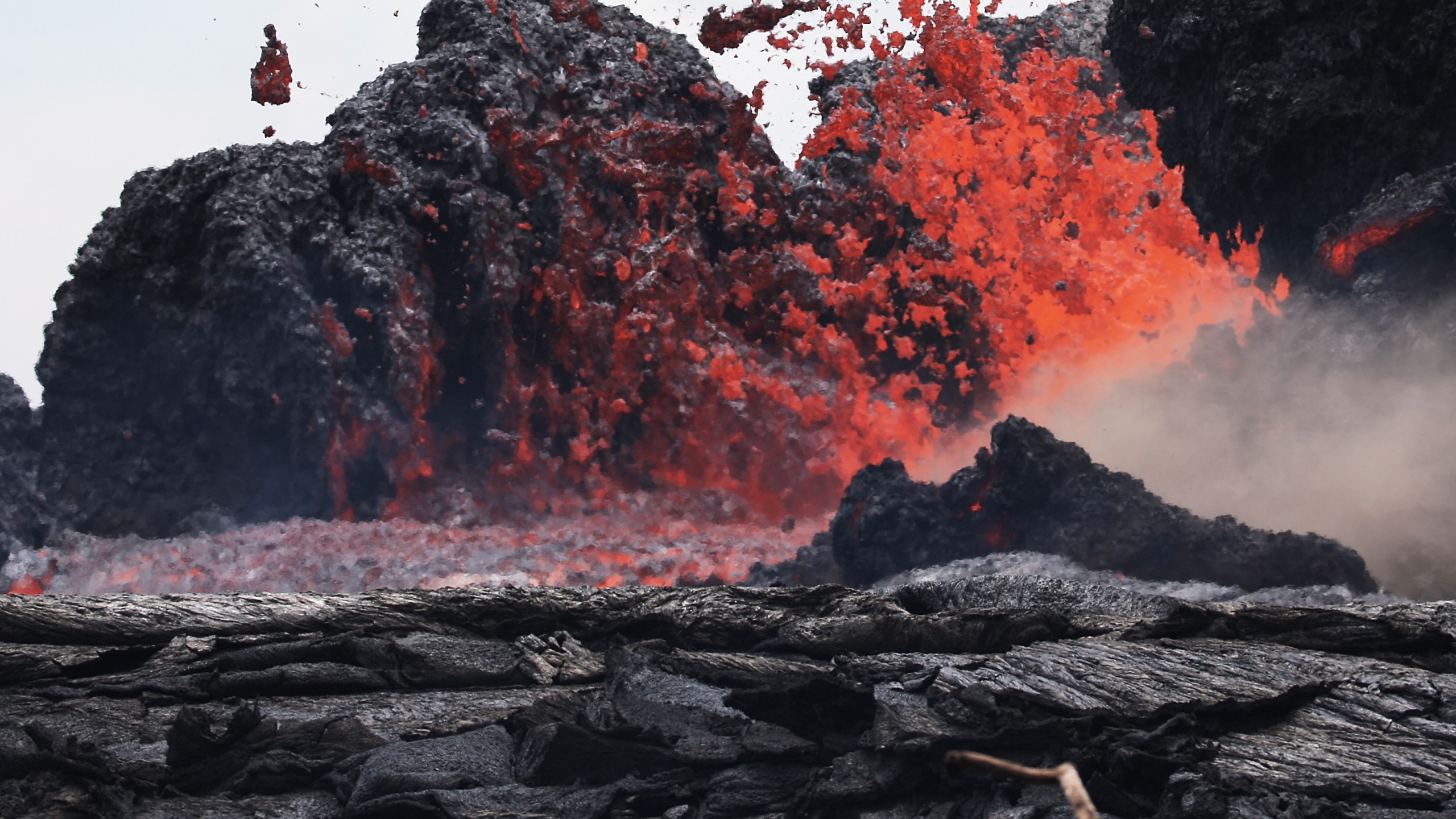 Lava erupts from a Kilauea volcano fissure in Leilani Estates, on Hawaii's Big Island, on May 24, 2018, in Pahoa, Hawaii. (Credit: Mario Tama/Getty Images)