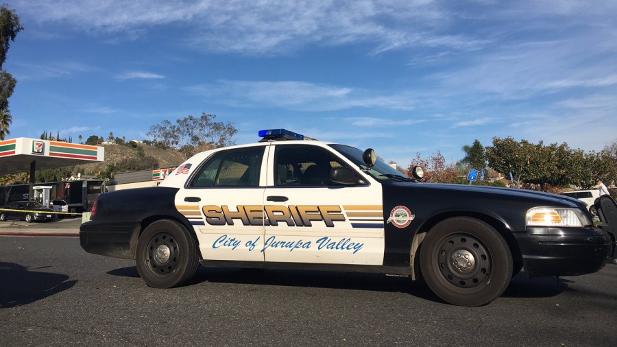 A Riverside County sheriff's vehicle is seen at the scene in Jurupa Valley where a deputy fired shots at suspects on Dec. 26, 2018, in a photo released by the department.