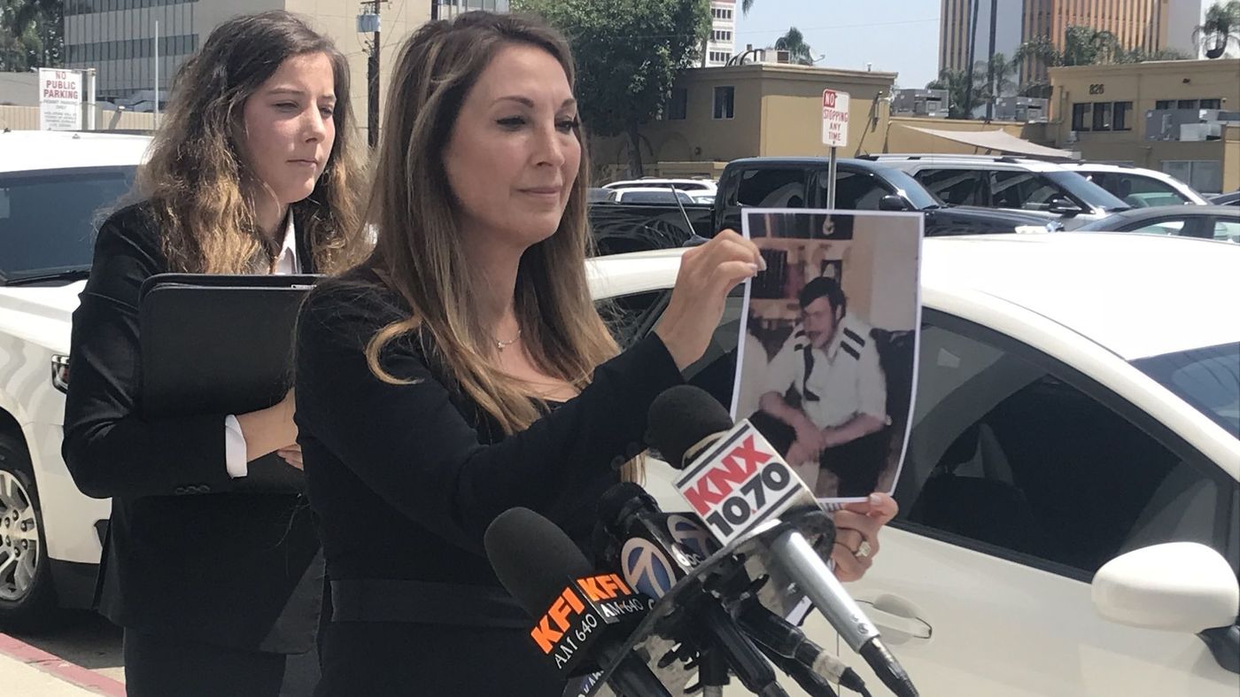 Laguna Beach lawyer Annee Della Donna holds a photo on July 25, 2018, of William Lee Evins, who pleaded guilty in 1985 to killing Joan Virginia Anderson of Fountain Valley six years earlier. She argued he was wrongfully convicted, and that his victim was really killed by the prolific Golden State Killer serial killer. (Credit: Los Angeles Times/Hannah Fry)