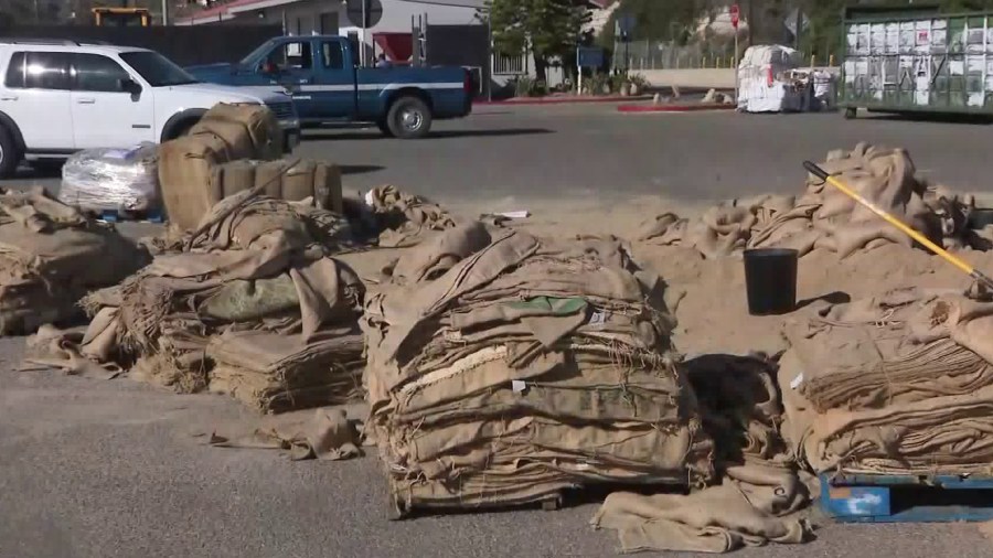 Sandbags are seen piled up in Malibu on Dec. 4, 2018, as local residents prepare for the possibility of mudslides triggered by coming rains. (Credit: KTLA)