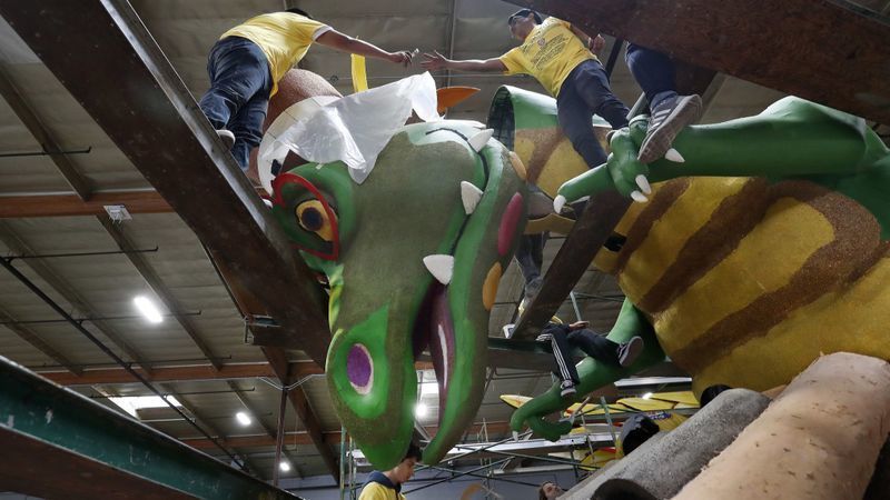 Workers in Irwindale prepare a Rose Parade float for Rotary International that will debut Jan. 1 in the 2019 Rose Parade in Pasadena on New Year's Day. A carriage fee dispute threatens KTLA Channel 5's Rose Parade coverage for Spectrum customers. (Credit: Mel Melcon / Los Angeles Times)