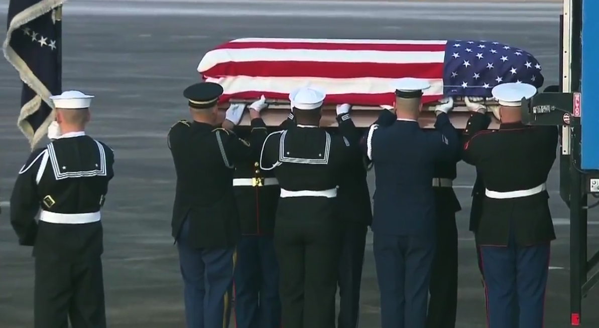 The casket of former President George H.W. Bush arrives in Houston. (Credit: CNN)