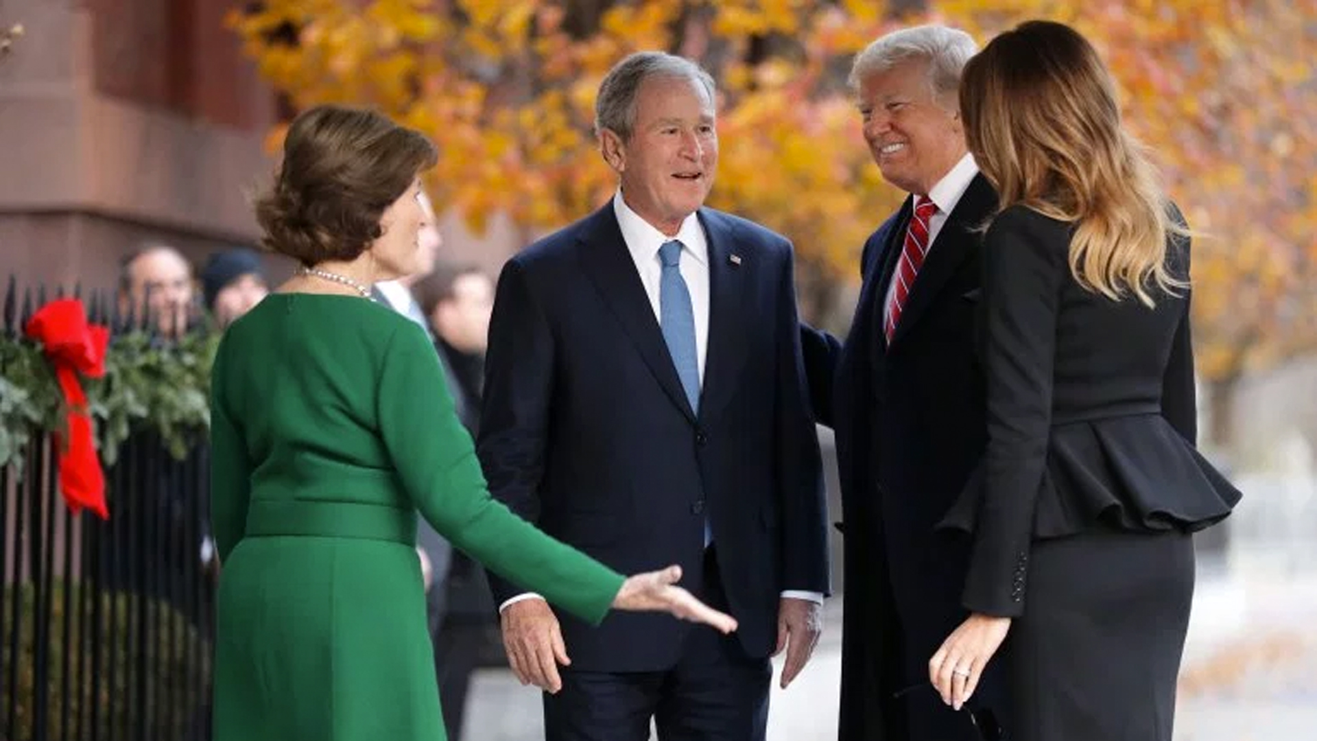 Former first lady Laura Bush and former President George W. Bush greet President Donald Trump and first lady Melania Trump outside of Blair House Dec. 4, 2018, in Washington, D.C. (Credit: Chip Somodevilla/Getty Images)