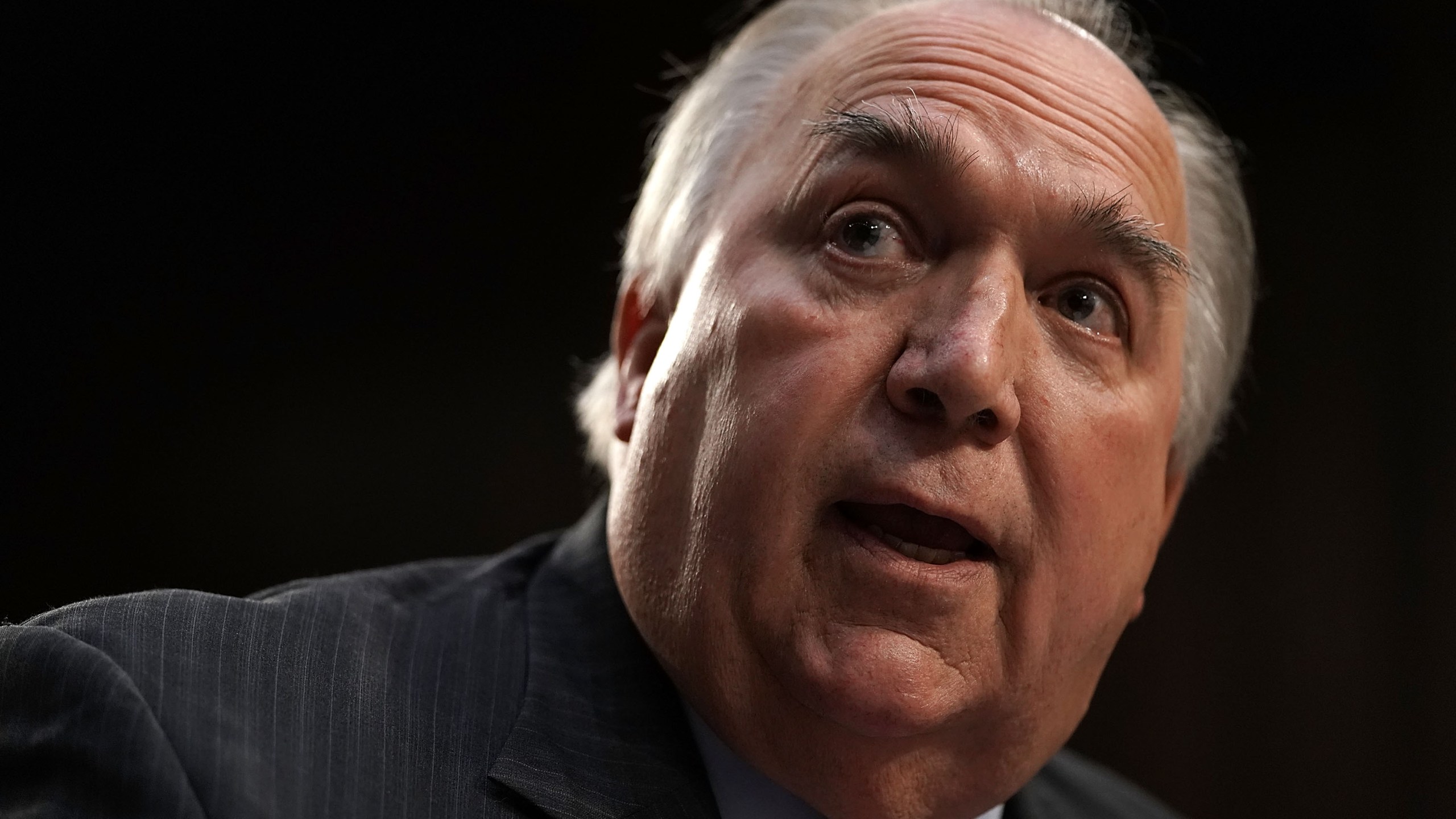 Interim President of Michigan State University and former Michigan Gov. John Engler testifies during a hearing before a Senate subcommittee on July 24, 2018. (Credit: Alex Wong / Getty Images)