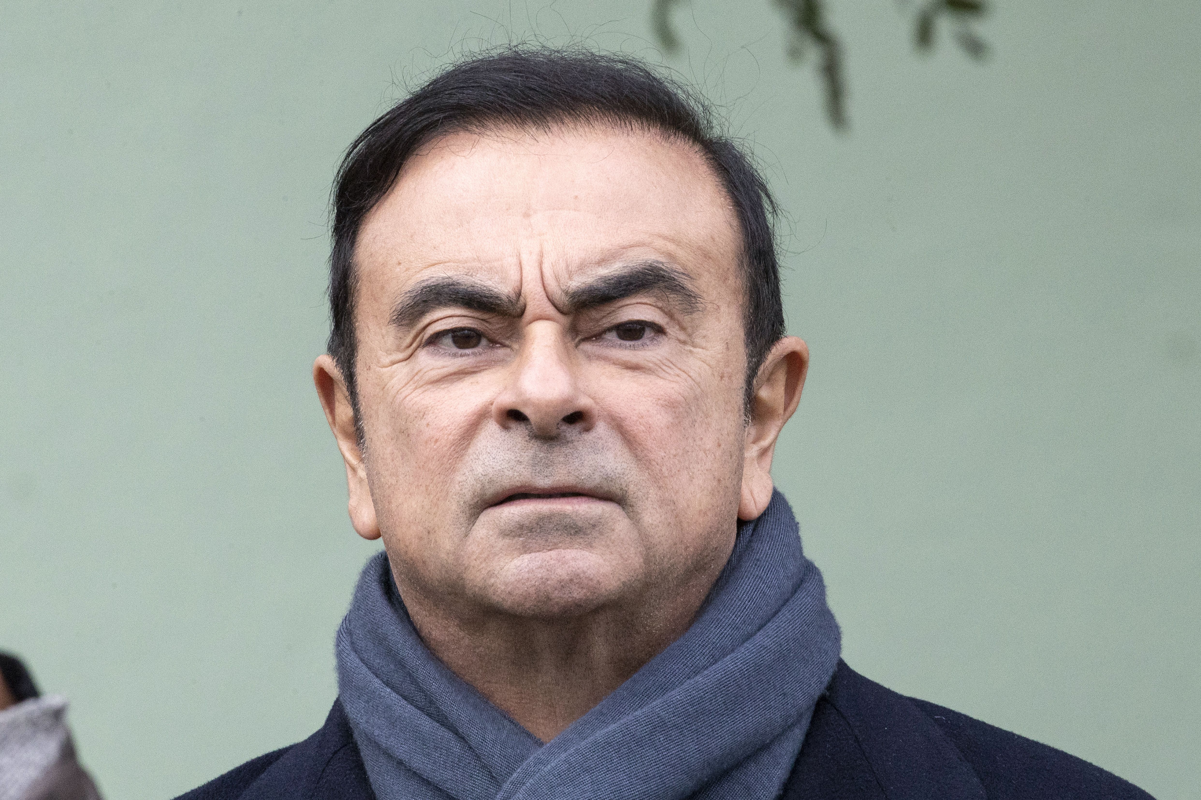 Nissan chairman Carlos Ghosn waits for the French President Emmanuel Macron to arrive for a visit of the Renault factory in Maubeuge northeastern France on Nov. 8, 2018. (Credit: Etienne Laurent/AFP/Getty Images)