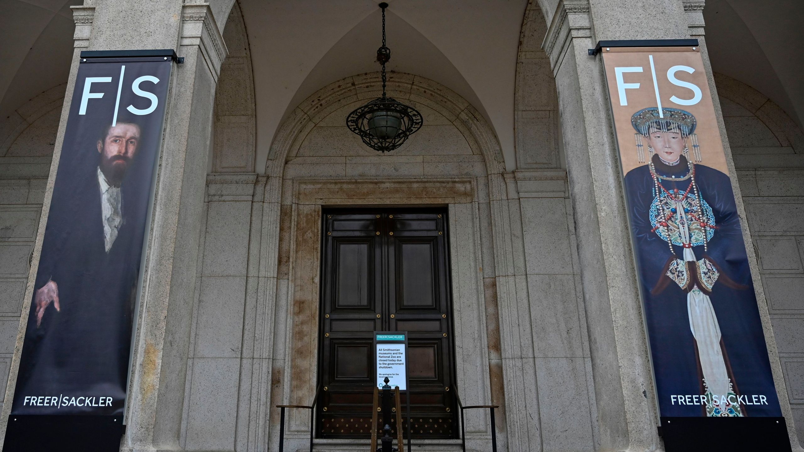 A sign is posted at the entrance of Arthur M. Sackler Gallery, stating that all Smithsonian Museums are closed due to the partial shutdown of the US government on January 2, 2019 in Washington, DC. (Credit: ANDREW CABALLERO-REYNOLDS/AFP/Getty Images)