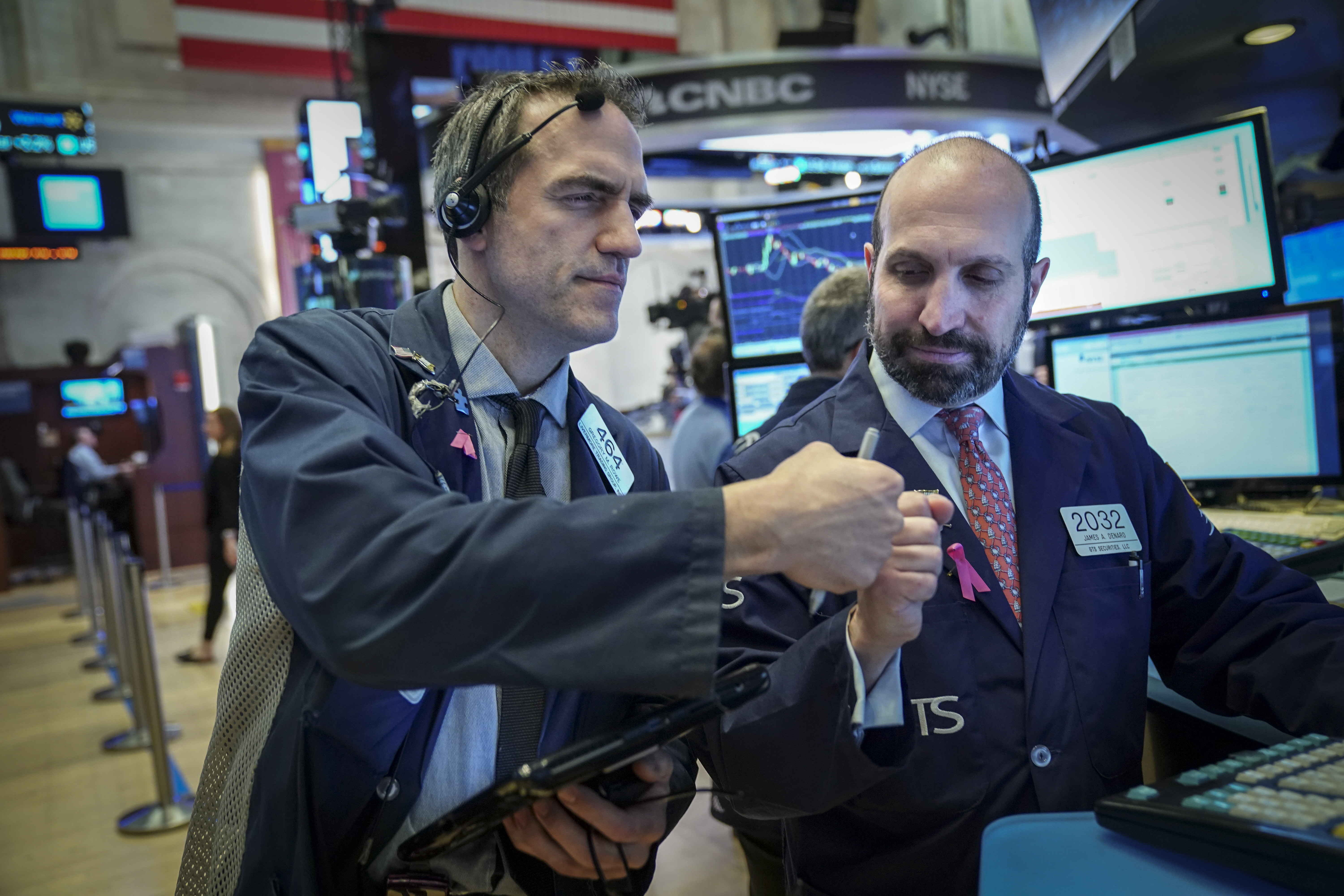 Traders and financial professionals work on the floor of the New York Stock Exchange (NYSE) ahead of the opening bell, January 4, 2019 in New York City. (Credit: Drew Angerer/Getty Images)