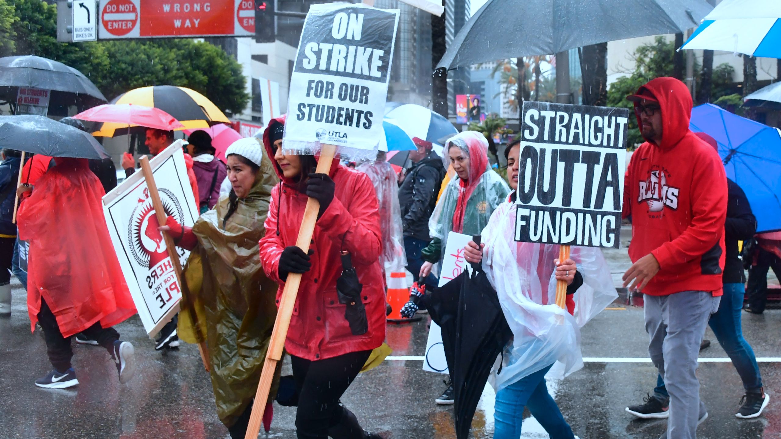 Thousands of teachers marched in the rain through Los Angeles on Jan. 14, 2019, on the first day of the first teachers' strike in 30 years targeting the Los Angeles Unified School District. (Credit: Frederic J. Brown / AFP / Getty Images)