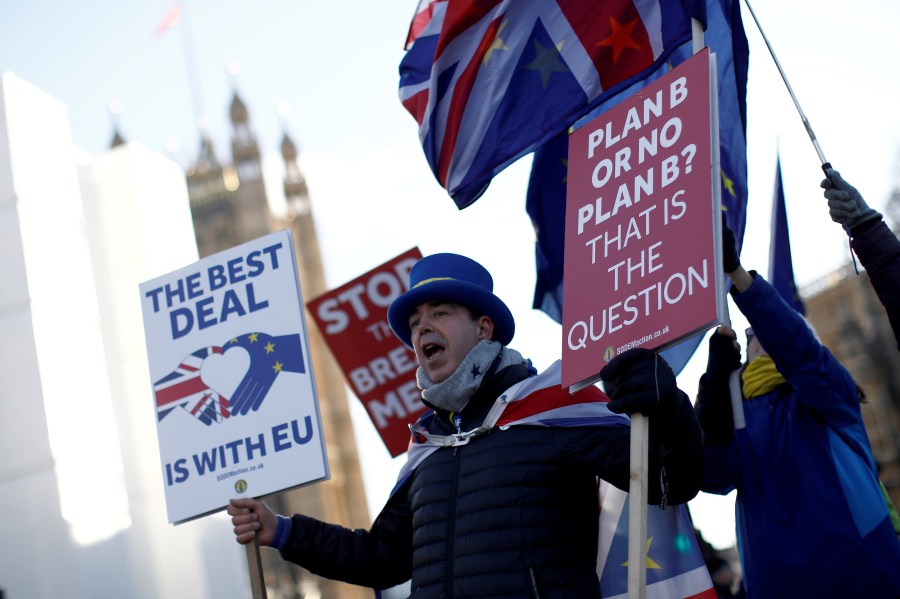 Anti-Brexit campaigner Steve Bray holds placards as he demonstrates near the Houses of Parliament in central London on Jan. 28, 2019. (Credit: TOLGA AKMEN/AFP/Getty Images)