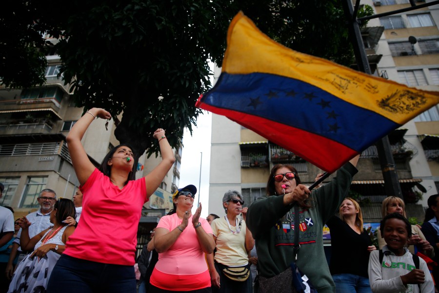 People shout during a demonstration against the government of President Nicolás Maduro on Jan. 30, 2019, in Caracas, Venezuela. (Credit: Marco Bello/Getty Images)