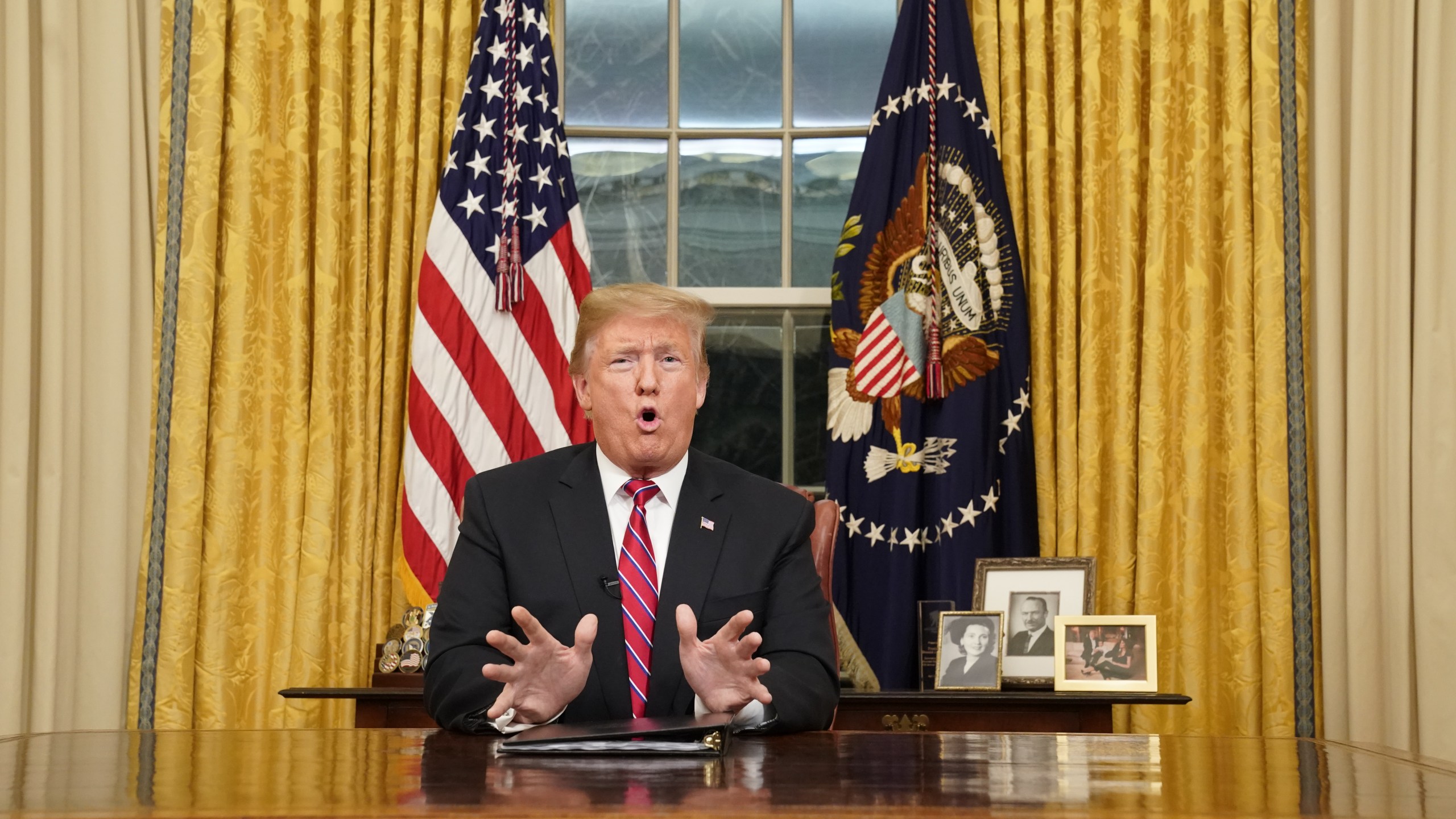 President Donald Trump speaks to the nation in his first prime-time address from the Oval Office on Jan. 8, 2019. (Credit: Carlos Barria / Getty Images)