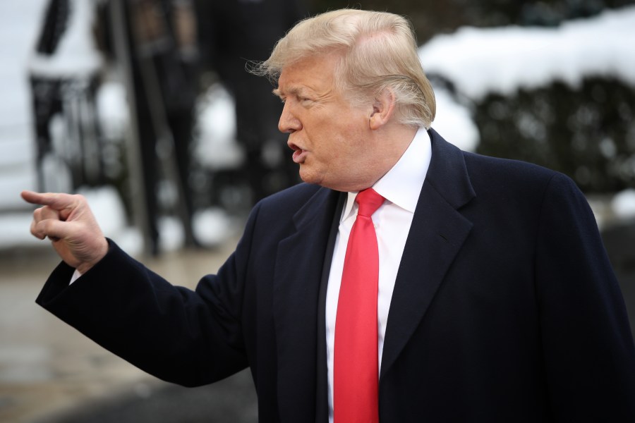 U.S. President Donald Trump answers questions from the press as he departs the White House January 14, 2019 in Washington, DC. (Credit: Win McNamee/Getty Images)