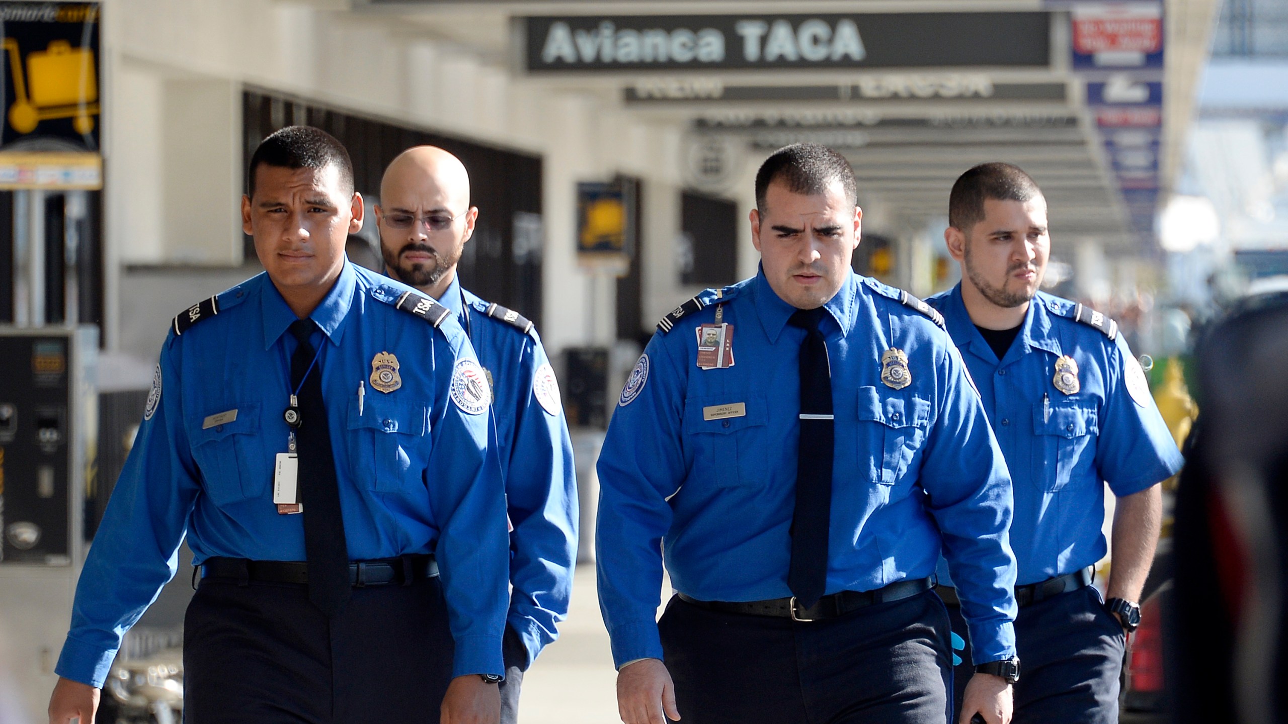 Transportation Security Administration agents walk on the departures level a day after a shooting that killed one Transportation Security Administration worker and injured several others at Los Angeles International Airport November 2, 2013 in Los Angeles, California.(Credit: Kevork Djansezian/Getty Images)