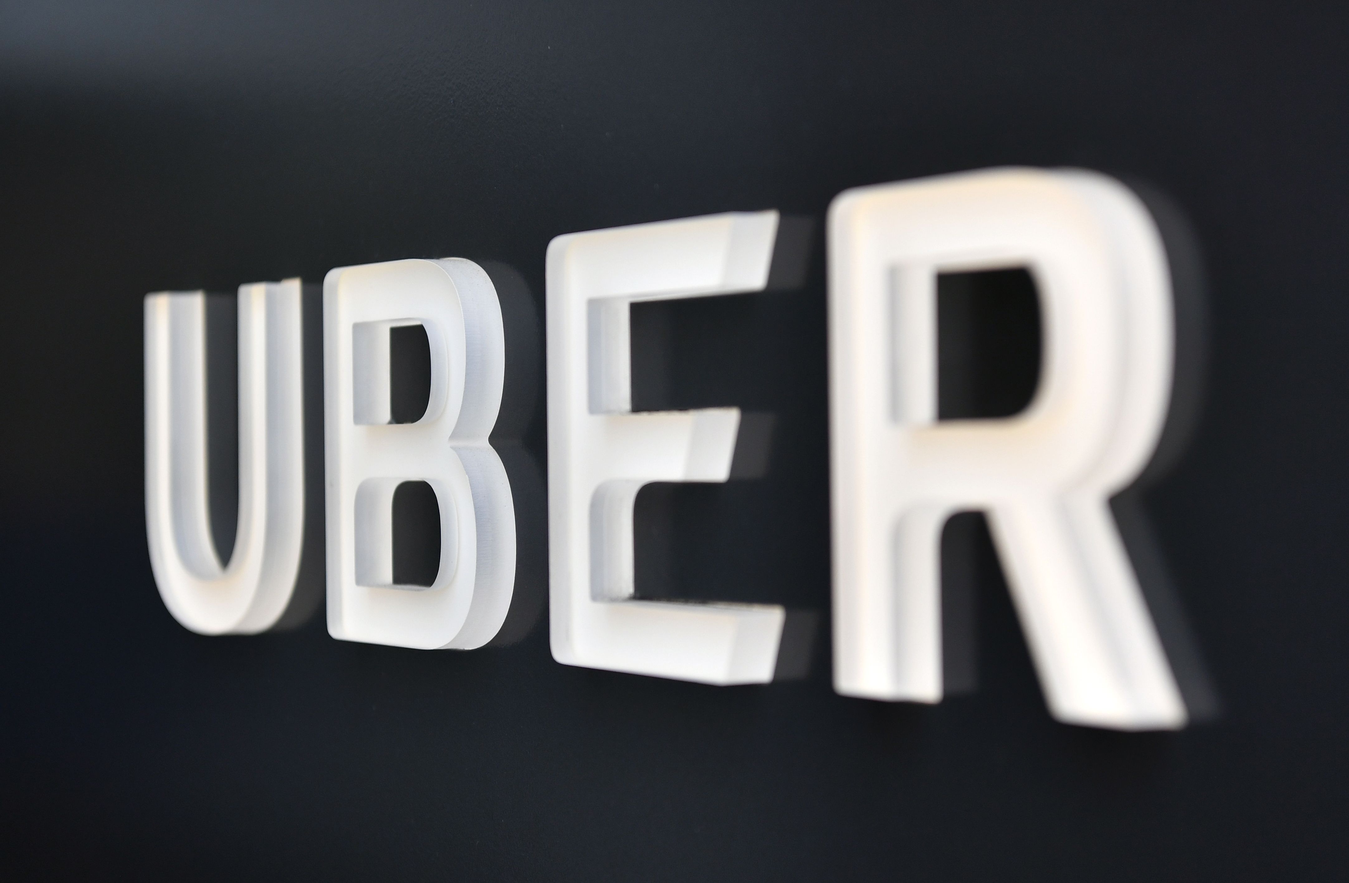 The Uber logo is seen outside the Uber Corporate Headquarters building in San Francisco, California on Feb. 5, 2018. (Credit: JOSH EDELSON/AFP/Getty Images)