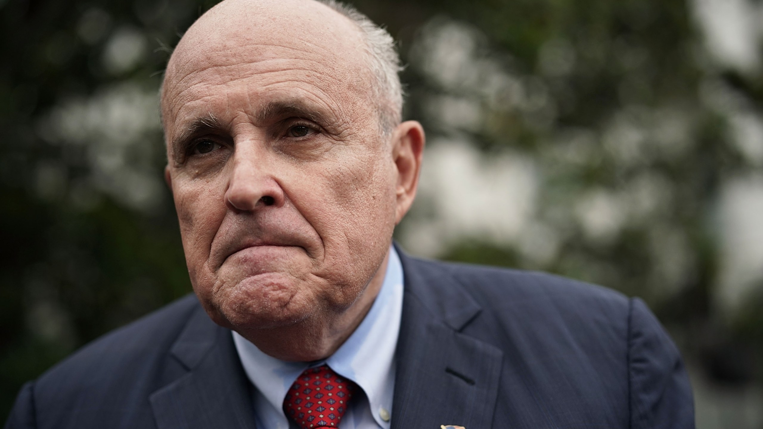 Rudy Giuliani, former New York City mayor and current lawyer for U.S. President Donald Trump, speaks to members of the media during a White House Sports and Fitness Day at the South Lawn of the White House May 30, 2018 in Washington, DC. (Credit: Alex Wong/Getty Images)