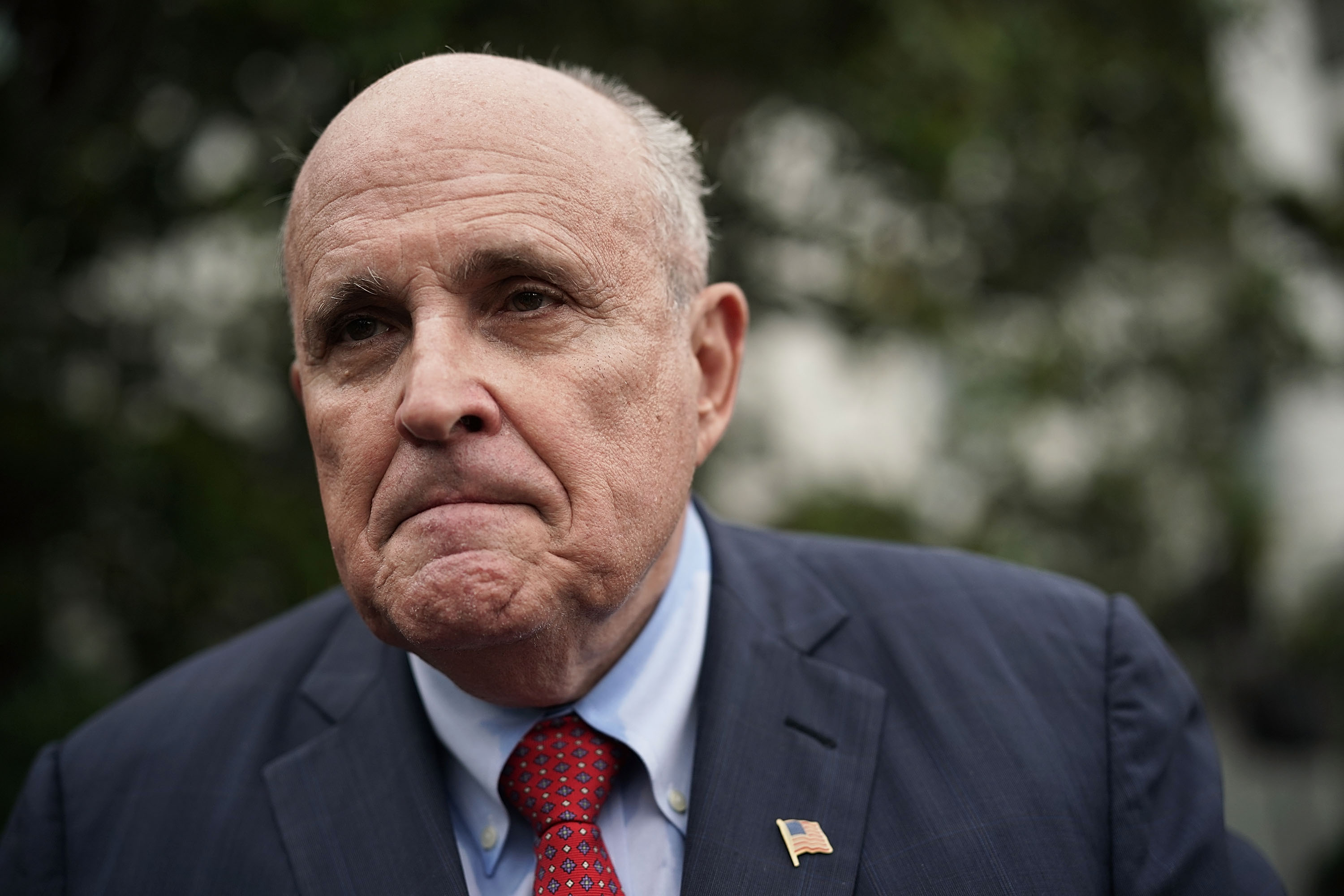 Rudy Giuliani, former New York City mayor and current lawyer for U.S. President Donald Trump, speaks to members of the media during a White House Sports and Fitness Day at the South Lawn of the White House May 30, 2018 in Washington, DC. (Credit: Alex Wong/Getty Images)