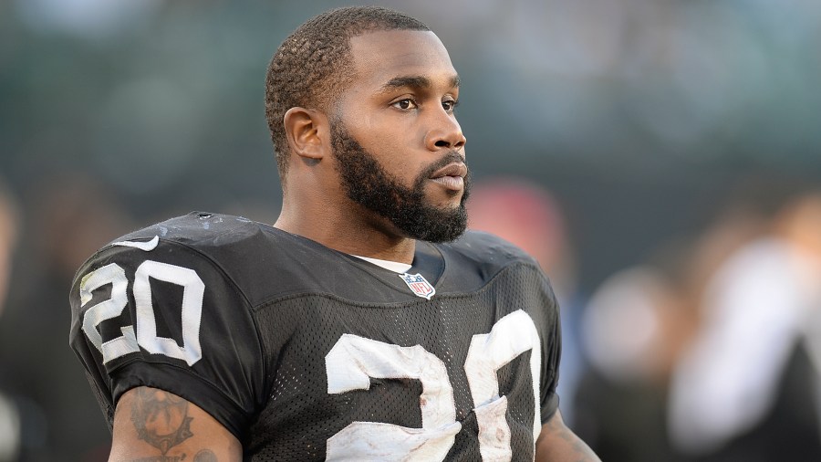 In this file photo, Darren McFadden of the Oakland Raiders looks on from the sidelines against the Denver Broncos on December 29, 2013 in Oakland. (Credit: Thearon W. Henderson/Getty Images)