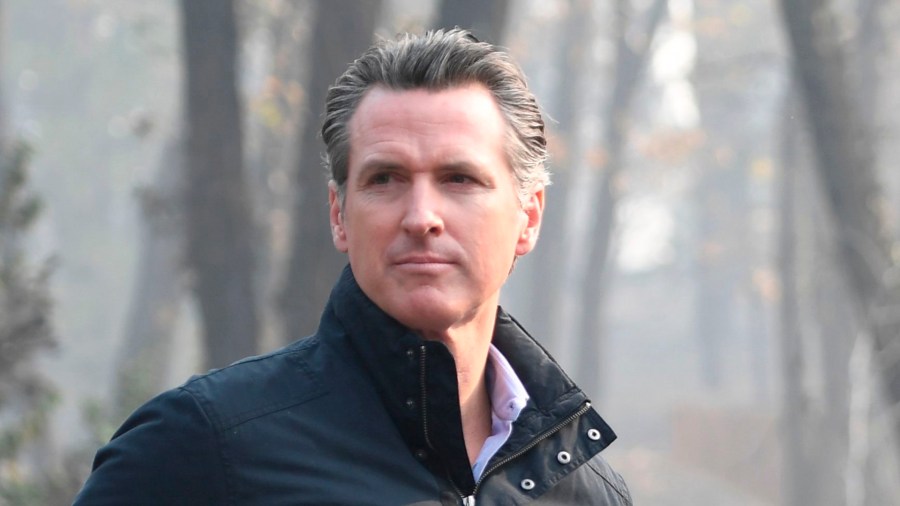 Then-Lt. Gov. Gavin Newsom views damage from wildfires in Paradise, Calif. on Nov. 17, 2018. (Credit: SAUL LOEB/AFP/Getty Images)