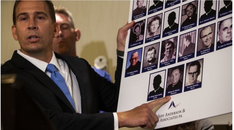 Attorney Mike Reck, at an L.A. news conference in October 2018, says his firm's report is intended to shine a spotlight on the history of alleged sexual abuse by priests in the San Bernardino Diocese. (Credit: Kent Nishimura / Los Angeles Times)