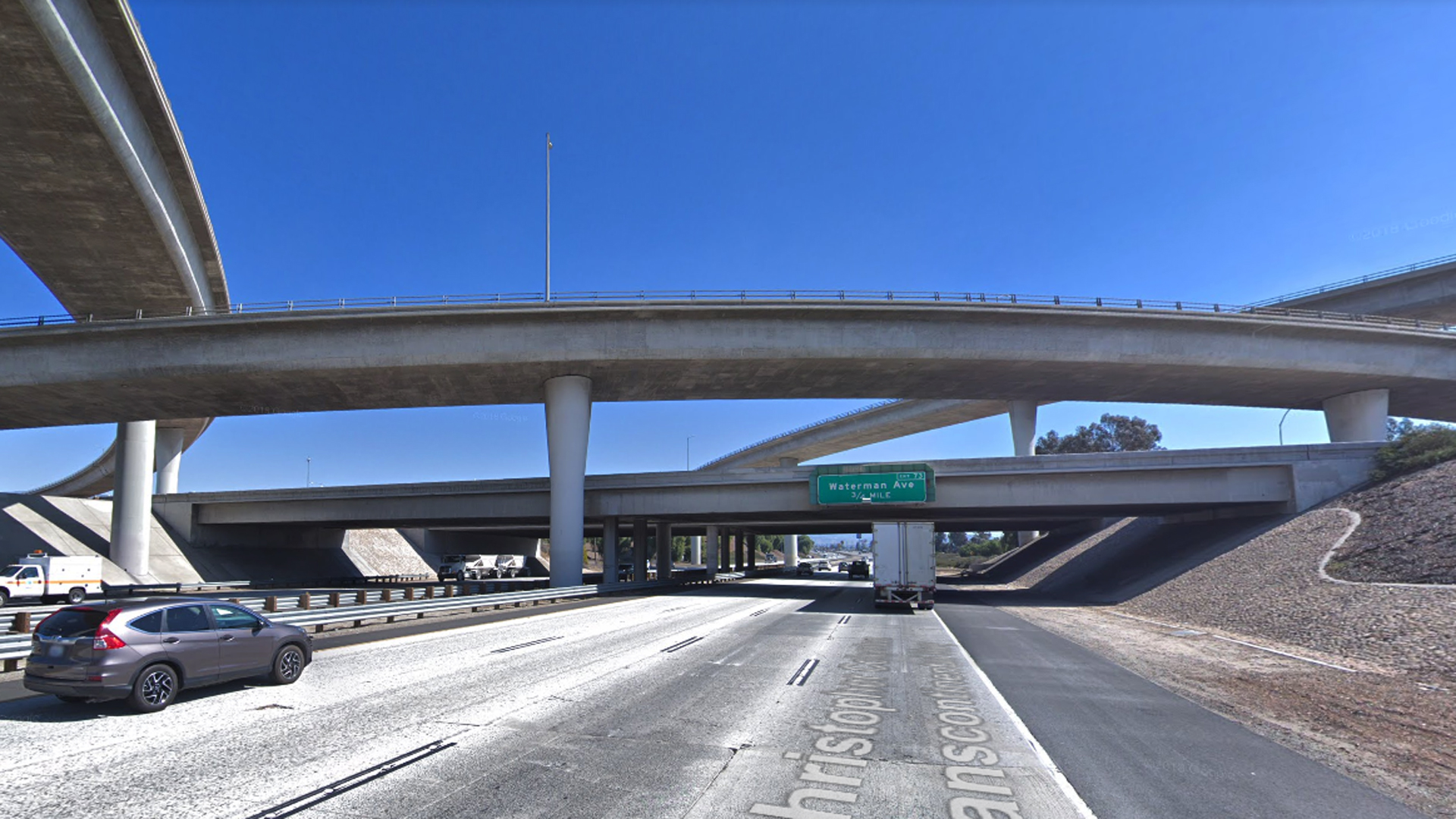 The eastbound 10 Freeway in Colton at the 215 Freeway overpass is seen in a Google Maps Street View image from March 2018.