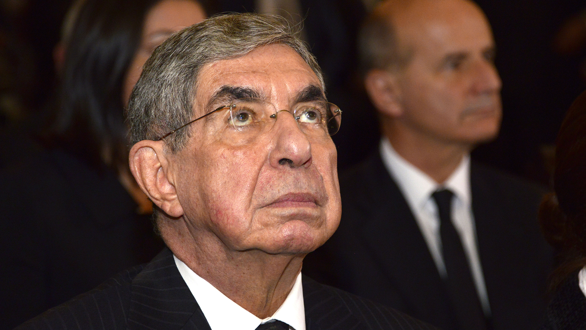 Nobel Peace Prize-winner and former Costa Rican president Oscar Arias Sanchez (1986-1990), (2006-2010) is seen during the funeral of former president Luis Alberto Monge (1982-1986) in the metropolitan cathedral of San Jose on Dec. 1, 2016.(Credit: EZEQUIEL BECERRA/AFP/Getty Images)