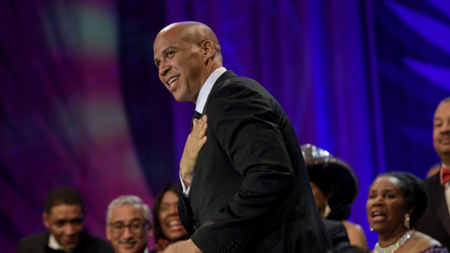 Rep. Cory Booker (D-NJ) arrives while being introduced with other African American members of the US Congress during the Congressional Black Caucus Foundation's Phoenix Awards Dinner Sept. 17, 2016, in Washington, D.C.(Credit: BRENDAN SMIALOWSKI/AFP/Getty Images)