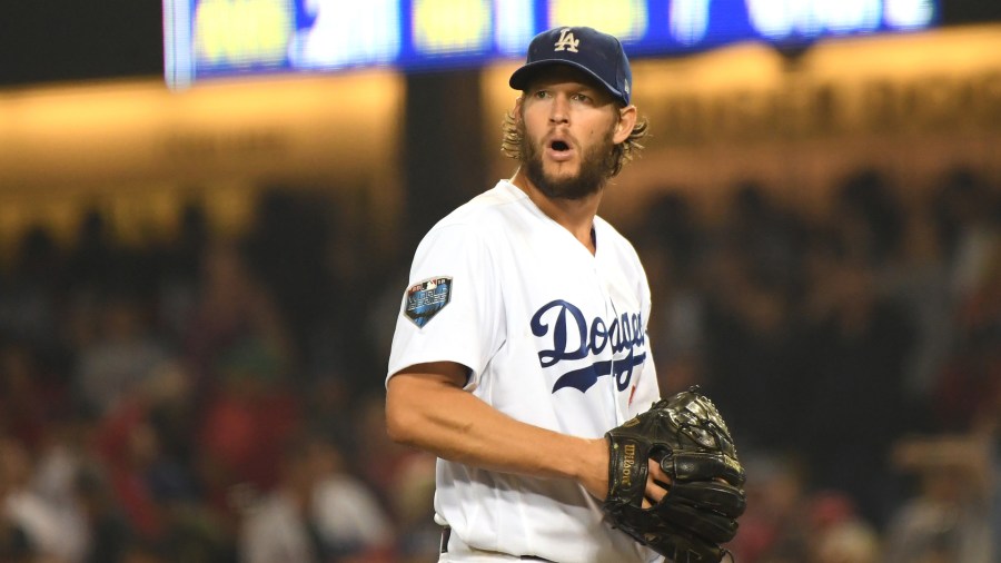 Clayton Kershaw of the Los Angeles Dodgers walks off the field after pitching during the seventh inning against the Boston Red Sox in Game Five of the 2018 World Series at Dodger Stadium on October 28, 2018. (Credit: Harry How/Getty Images)