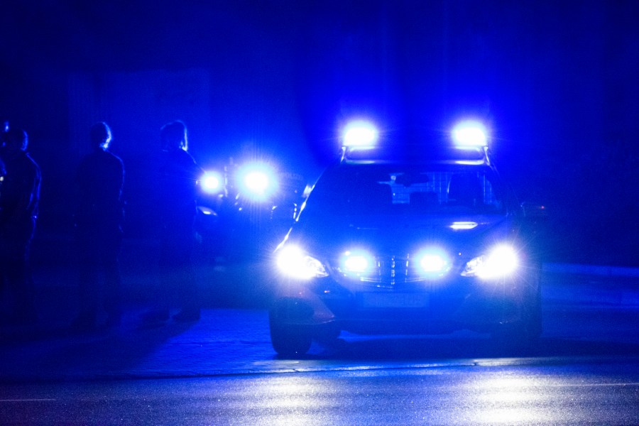 A car is seen at a traffic stop at night in this file photo. (Getty Images)