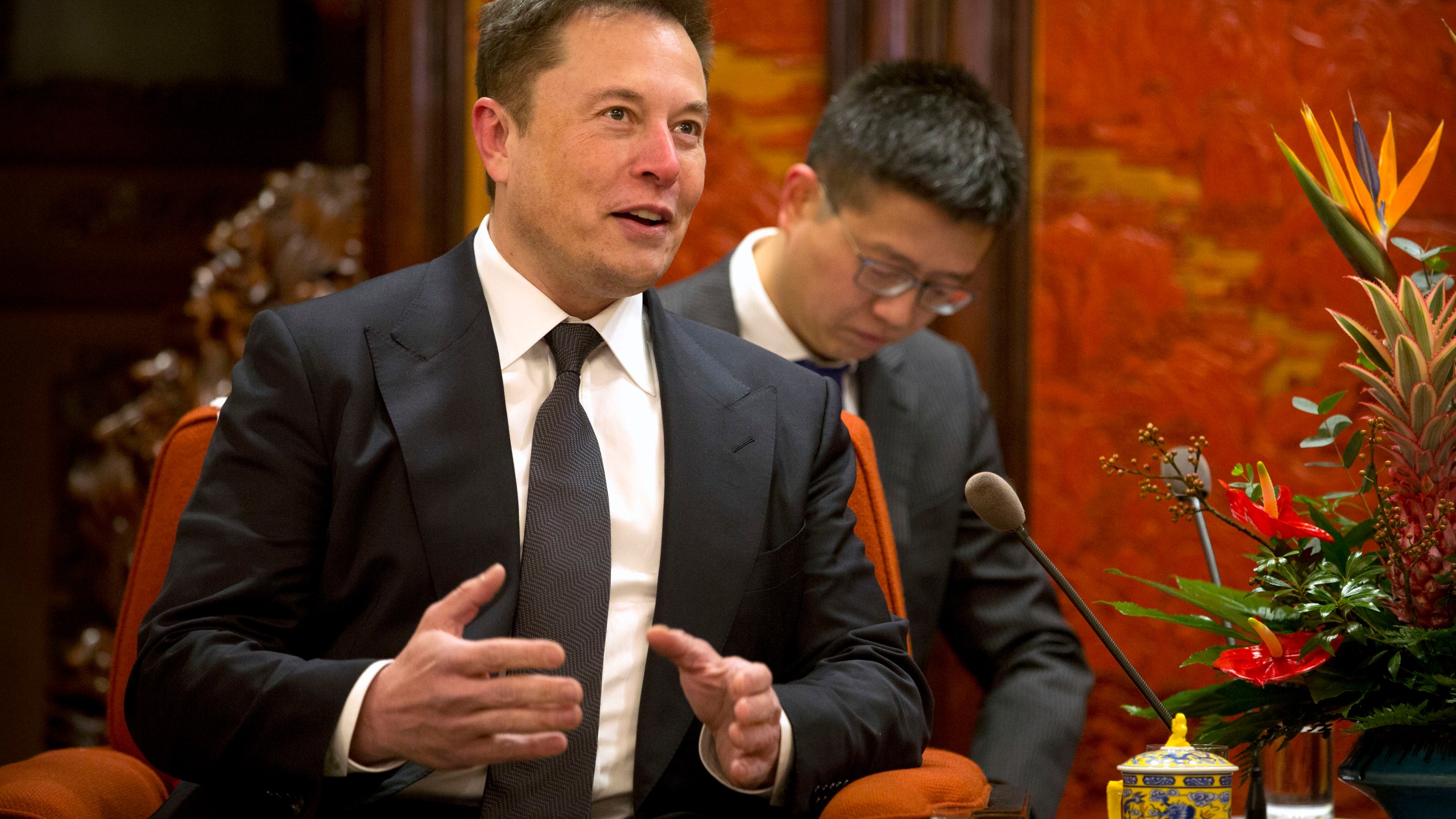 Tesla CEO Elon Musk speaks during a meeting with Chinese Premier Li Keqiang (not pictured) at the Zhongnanhai leadership compound in Beijing on Jan. 9, 2019. (Credit: Mark Schiefelbein / AFP / Getty Images)