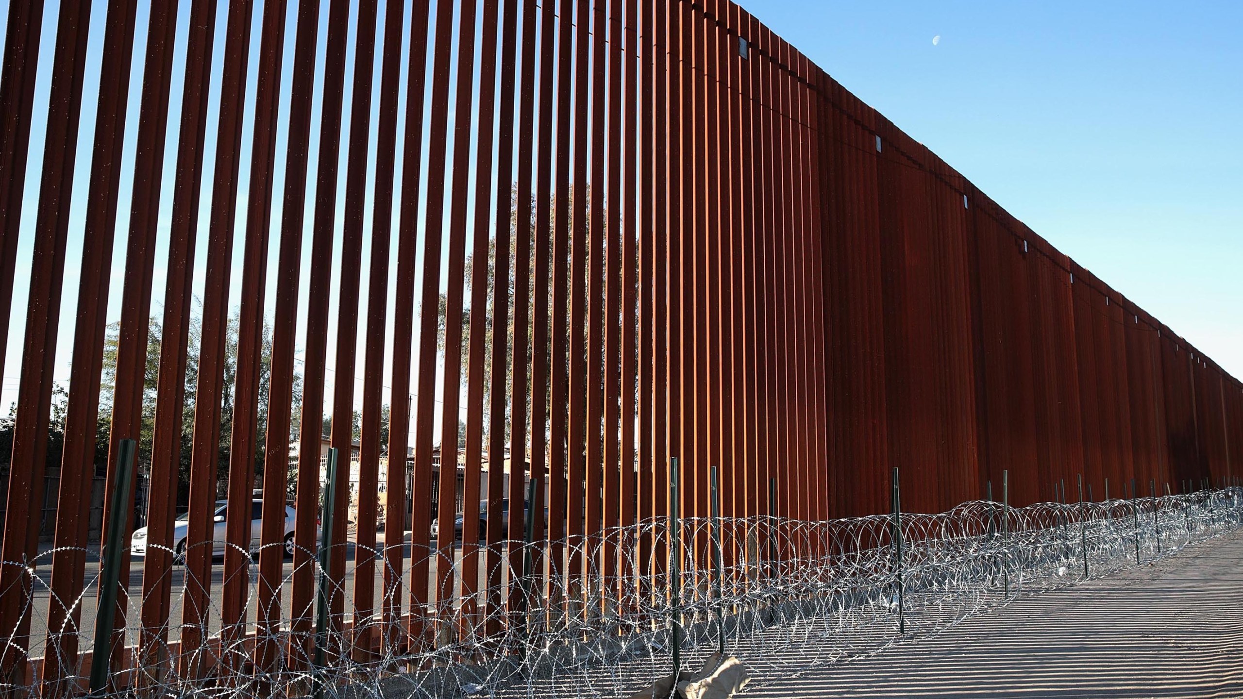 A steel and wire barrier runs along the border of the U.S. and Mexico on Jan. 26, 2019 in Calexico. (Credit: Scott Olson/Getty Images)