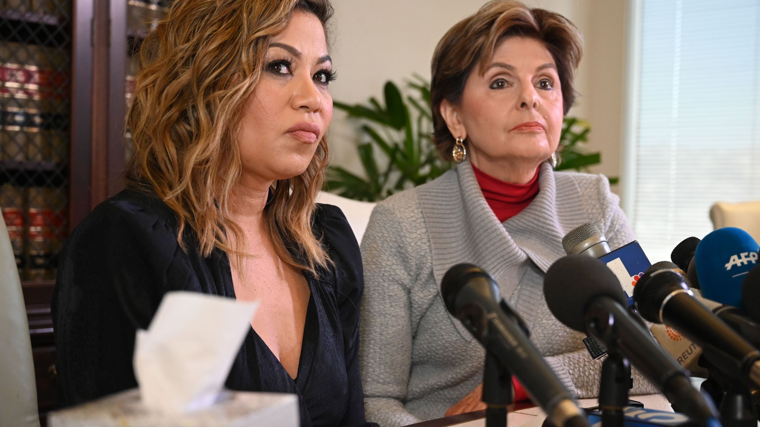 From left: Lizzette Martinez, an alleged underage victim of R. Kelly, and her attorney Gloria Allred speak at a press conference in Allred's office in Los Angeles on Feb. 25, 2019. (Credit: Robyn Beck / AFP / Getty Images)