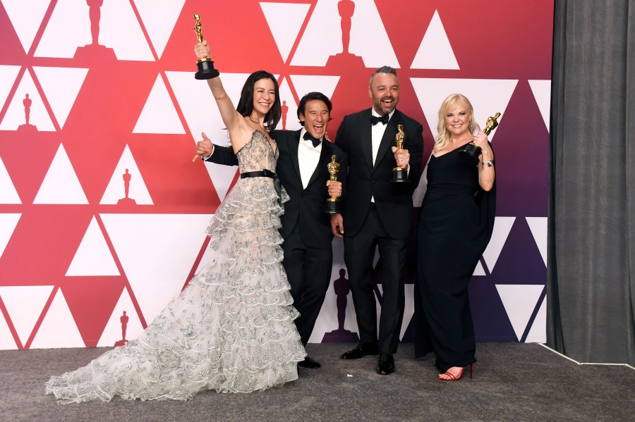 (L-R) Elizabeth Chai Vasarhelyi, Jimmy Chin, Evan Hayes, and Shannon Dill, winners of Best Documentary Feature for 'Free Solo,' pose in the press room during the 91st Annual Academy Awards at Hollywood and Highland on February 24, 2019 in Hollywood, California. (Credit: Frazer Harrison/Getty Images)