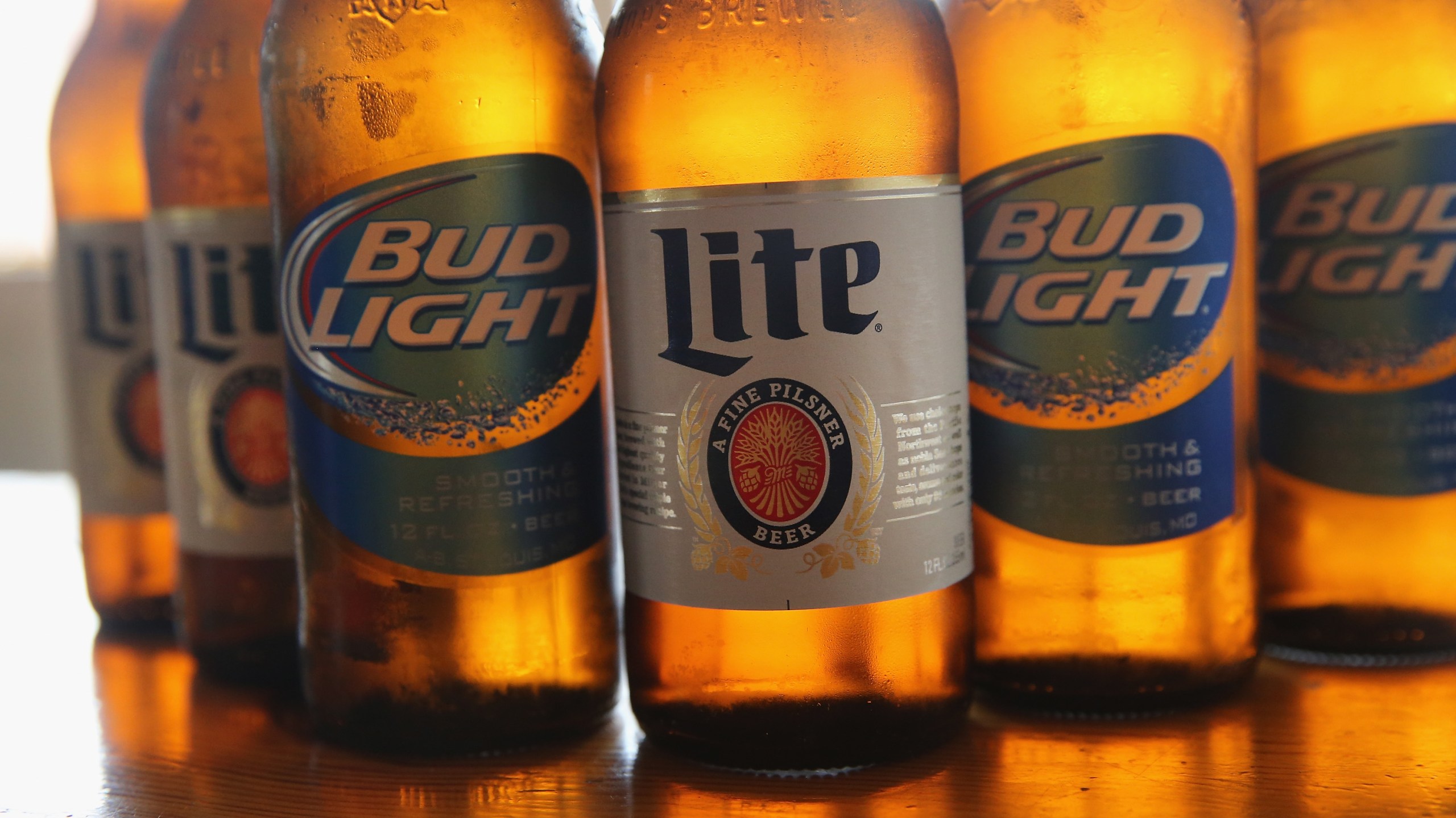 Bud Light and Miller Lite beers are seen in this photo. (Credit: Scott Olson/Getty Images)