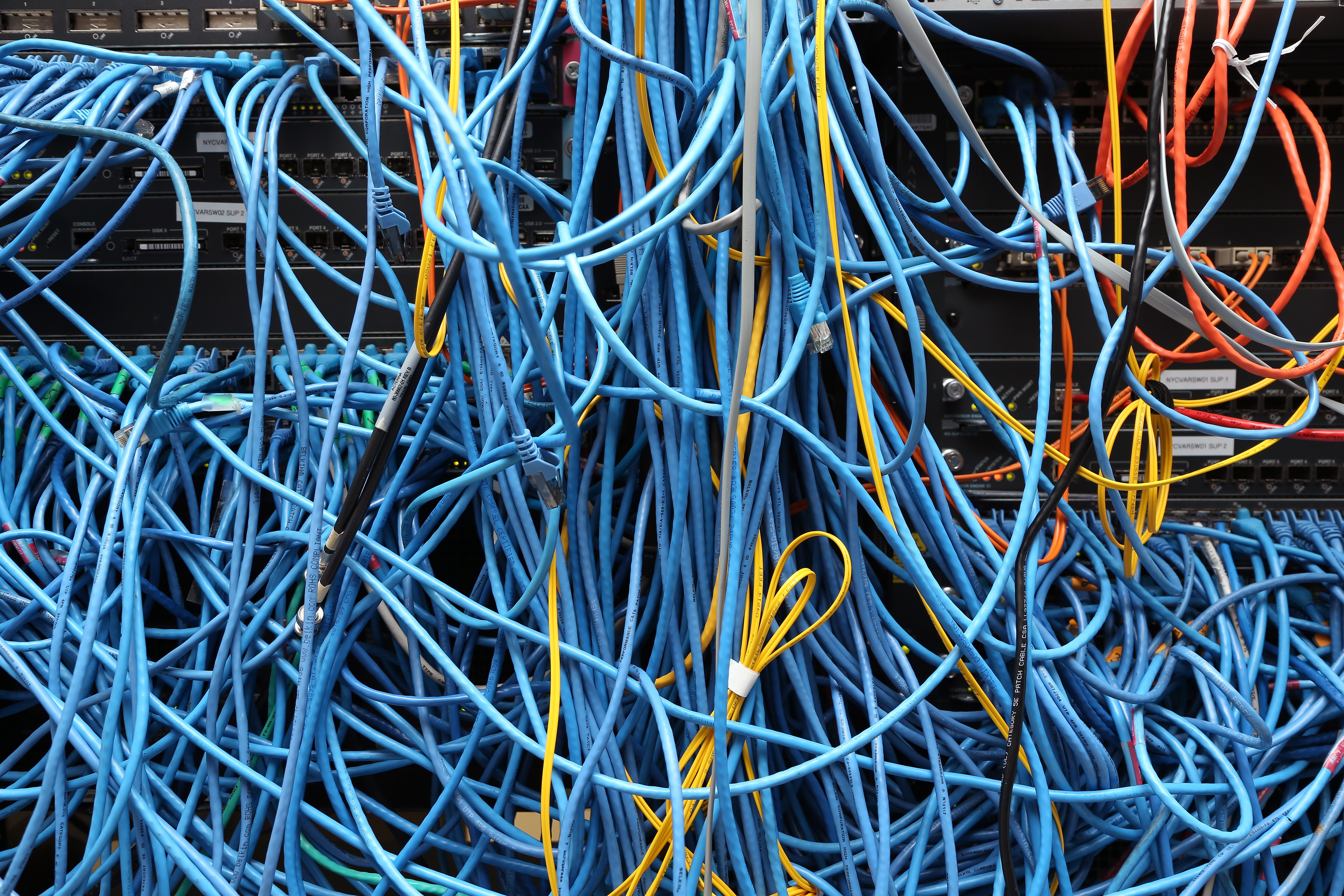 Network cables are plugged in a server room on Nov. 10, 2014, in New York City. (Credit: Michael Bocchieri / Getty Images)