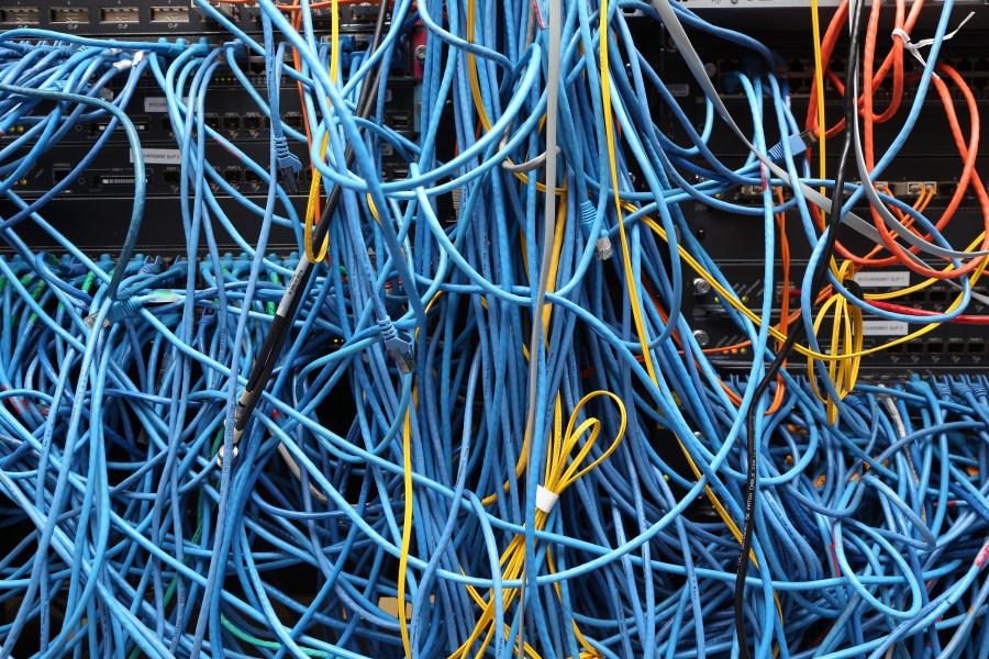 Network cables are plugged in a server room on Nov. 10, 2014, in New York City. (Credit: Michael Bocchieri / Getty Images)